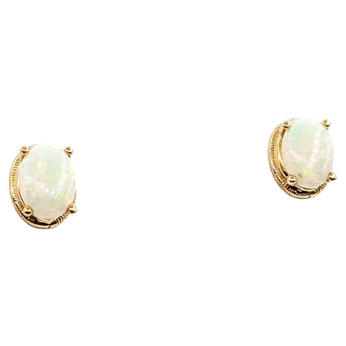 Orecchini con opale scanalato in 14k in vendita