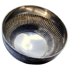 Fluted silver candy box set on a round pearl base