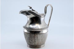Fluted silver milk jug with frieze and hinged lid in D. Maria style