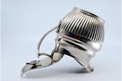 Fluted silver milk jug with half-body design and knobbed lid
