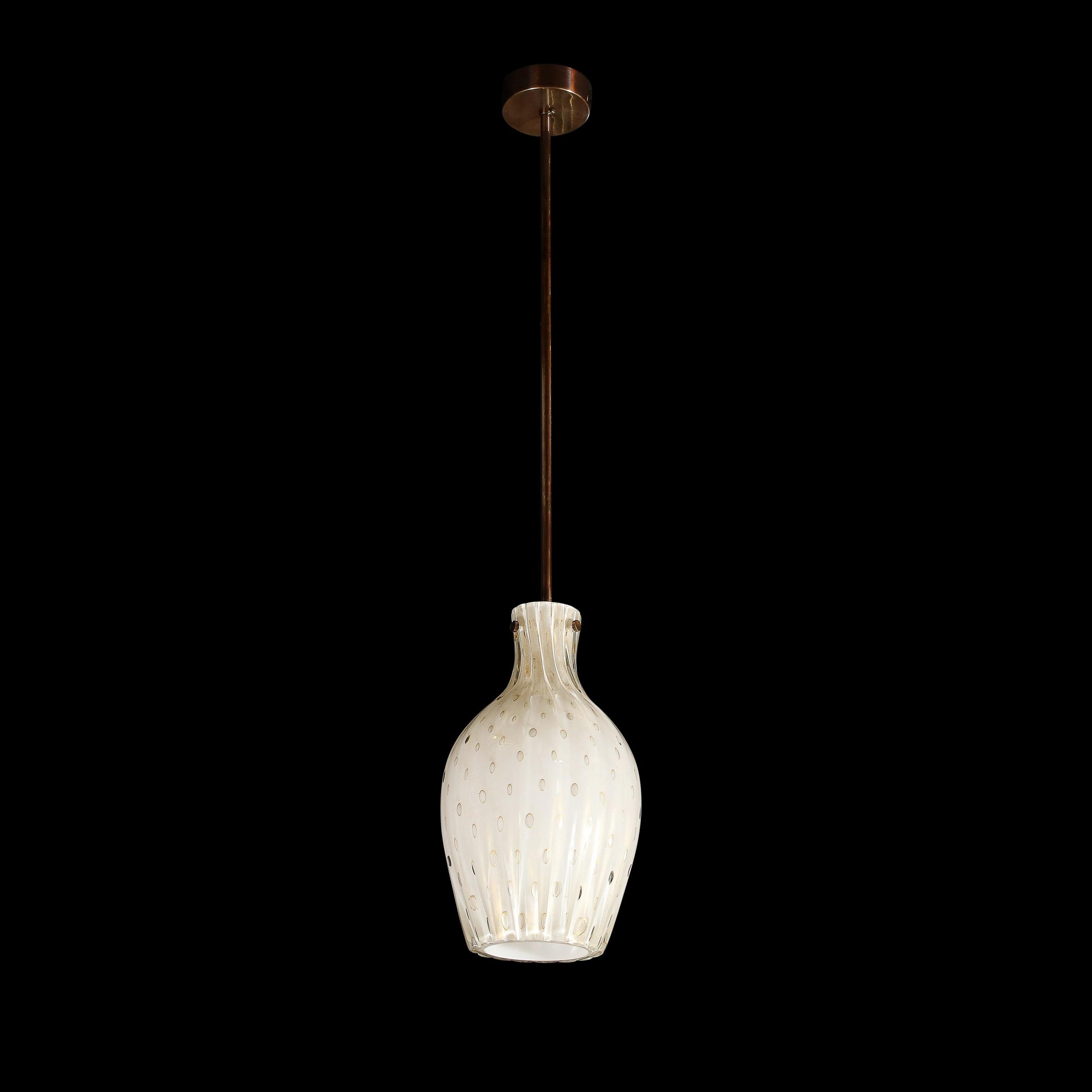 This elegant modernist pendant was handblown in Murano, Italy- the island off the coast of Venice renowned for centuries for its superlative glass production. It features a billowing, sinuously curved shade that recedes to a tapered neck and also