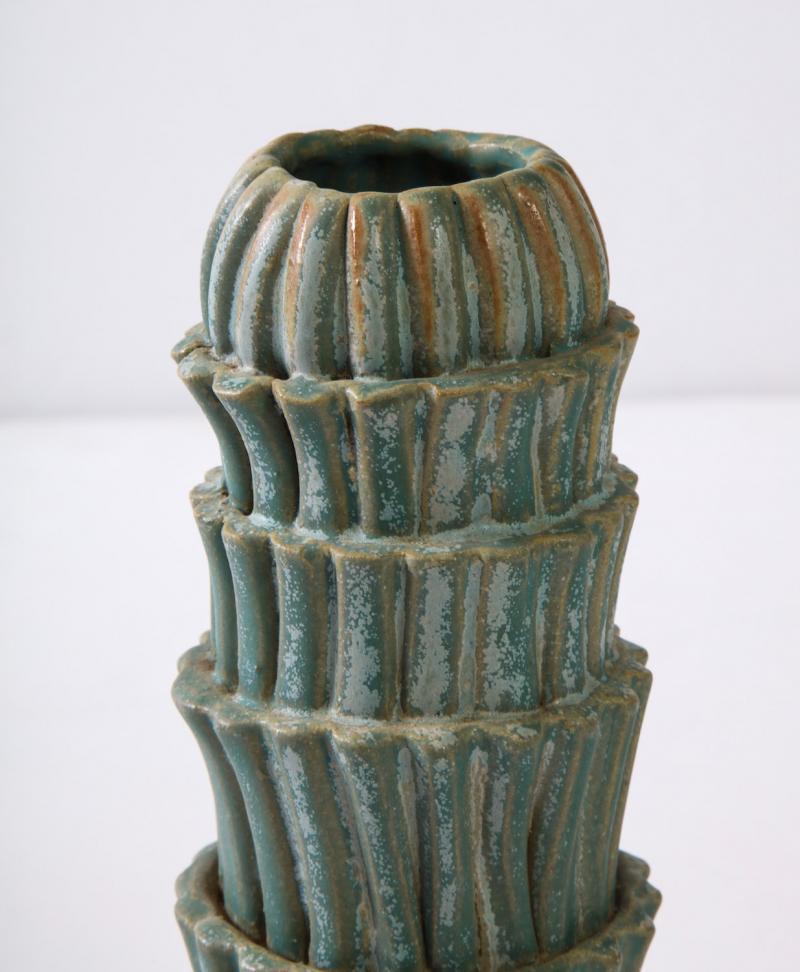 Fluted vase #2 by Robbie Heidinger. Cylindrical vase form of glazed stoneware. Stacked and ribbed elements.