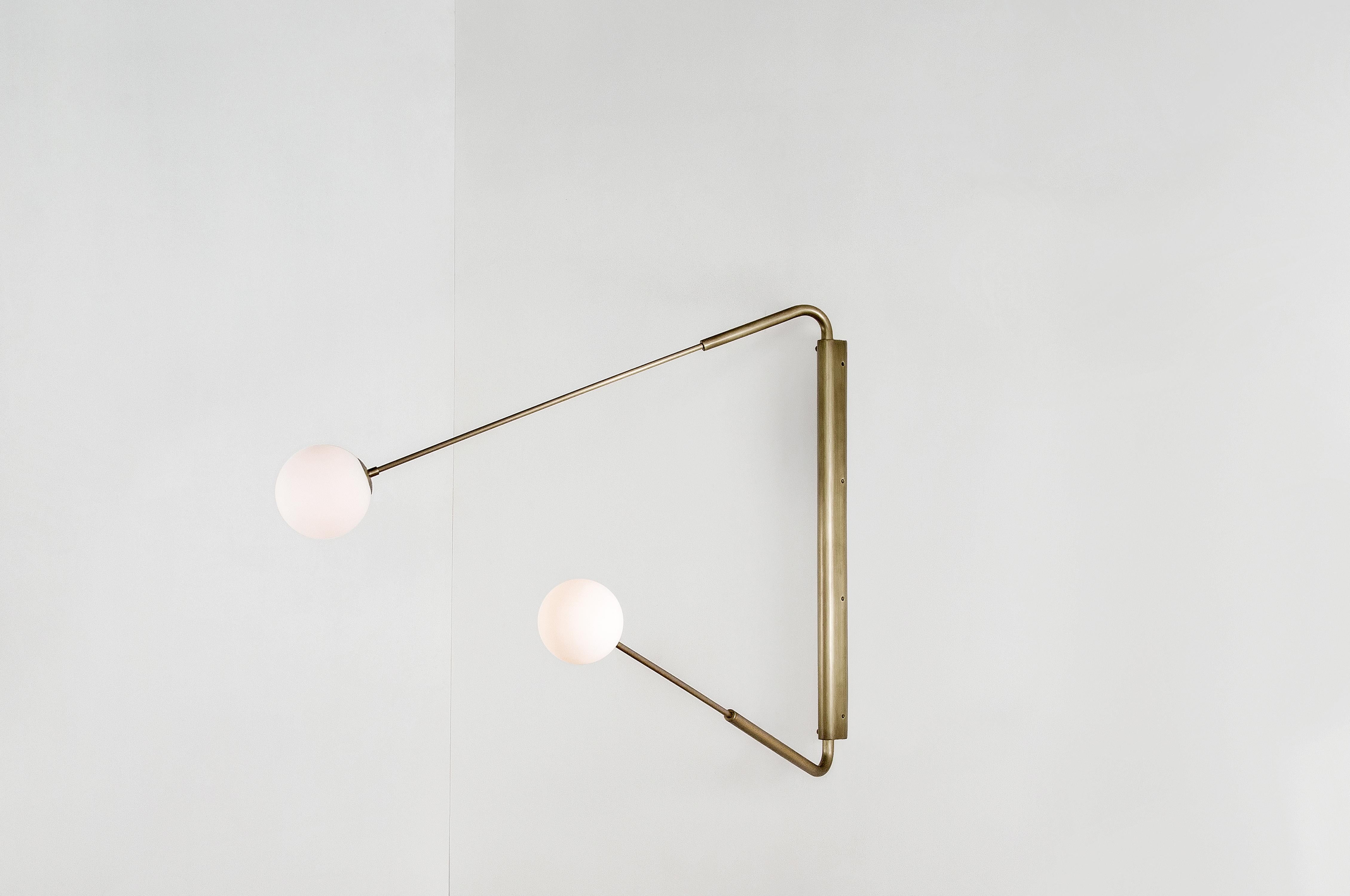 Flutter II, contemporary aged brass sconce by Paul Matter
Available in black burnt brass or black burnt brass with etched glass
Total measure: 40” H x 48” W
Globe to globe dimensions when fully opened: 95”’
Minimum 28” H x 34” W
Maximum 60” H x
