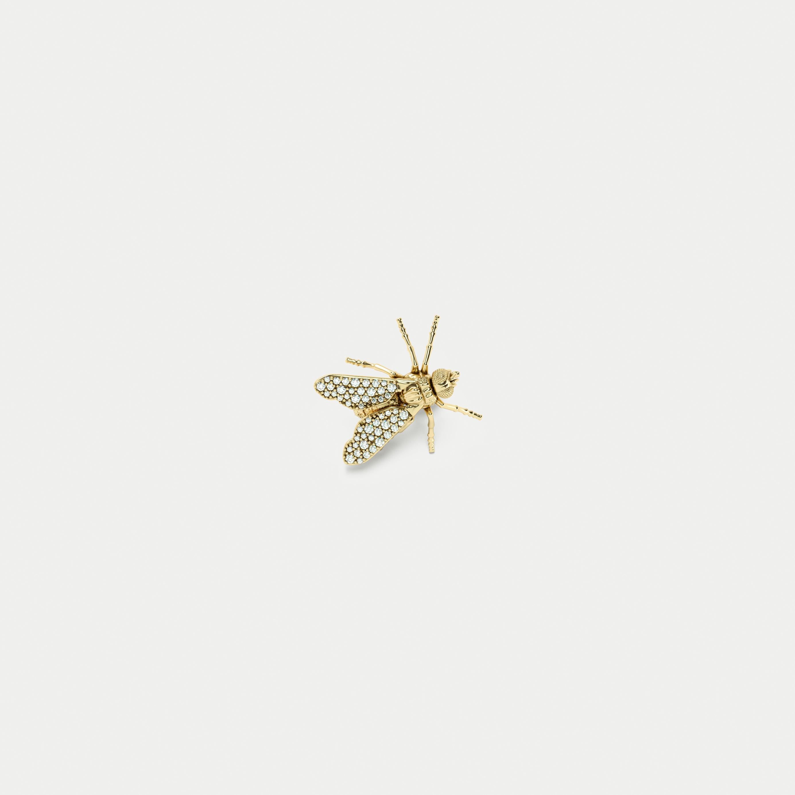 Golden Stud Fly Earring, 18K Yellow Gold with White Diamonds
42u. (1mm Ø) H/SI

Mono earring in the shape of two hyperrealistic flies is made of 18K yellow gold with white diamonds, full pavé.
The post and backing are made of steel, which provides