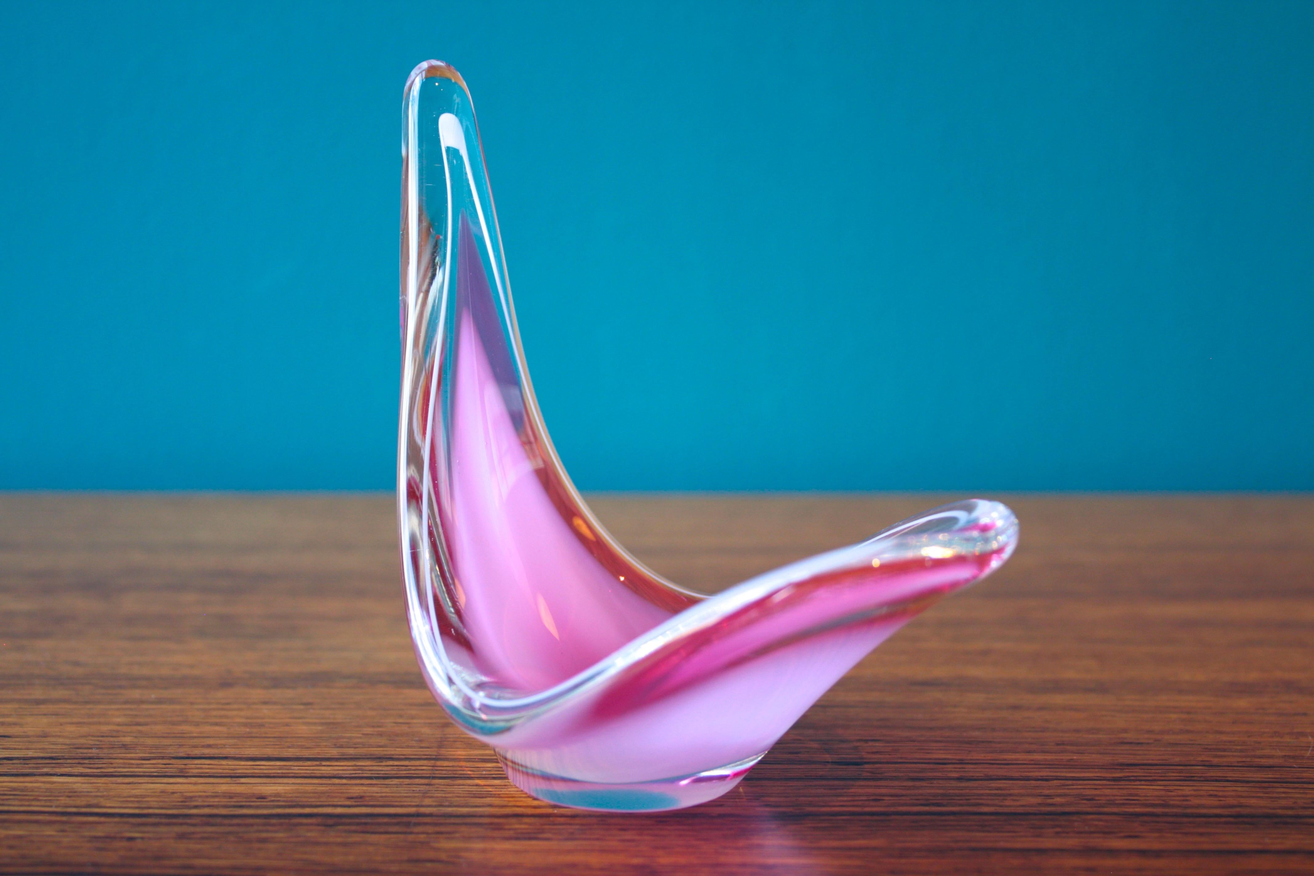 Flygsfors Coquille glass object, designed by Paul Kedelv, Sweden, 1958

Coquille glass object designed by Paul Kedelv and manufactured by Flygsfors Glassworks in Sweden in 1958. Marked on the base.
In 1949, Paul Kedelv joined Flygsfors and during