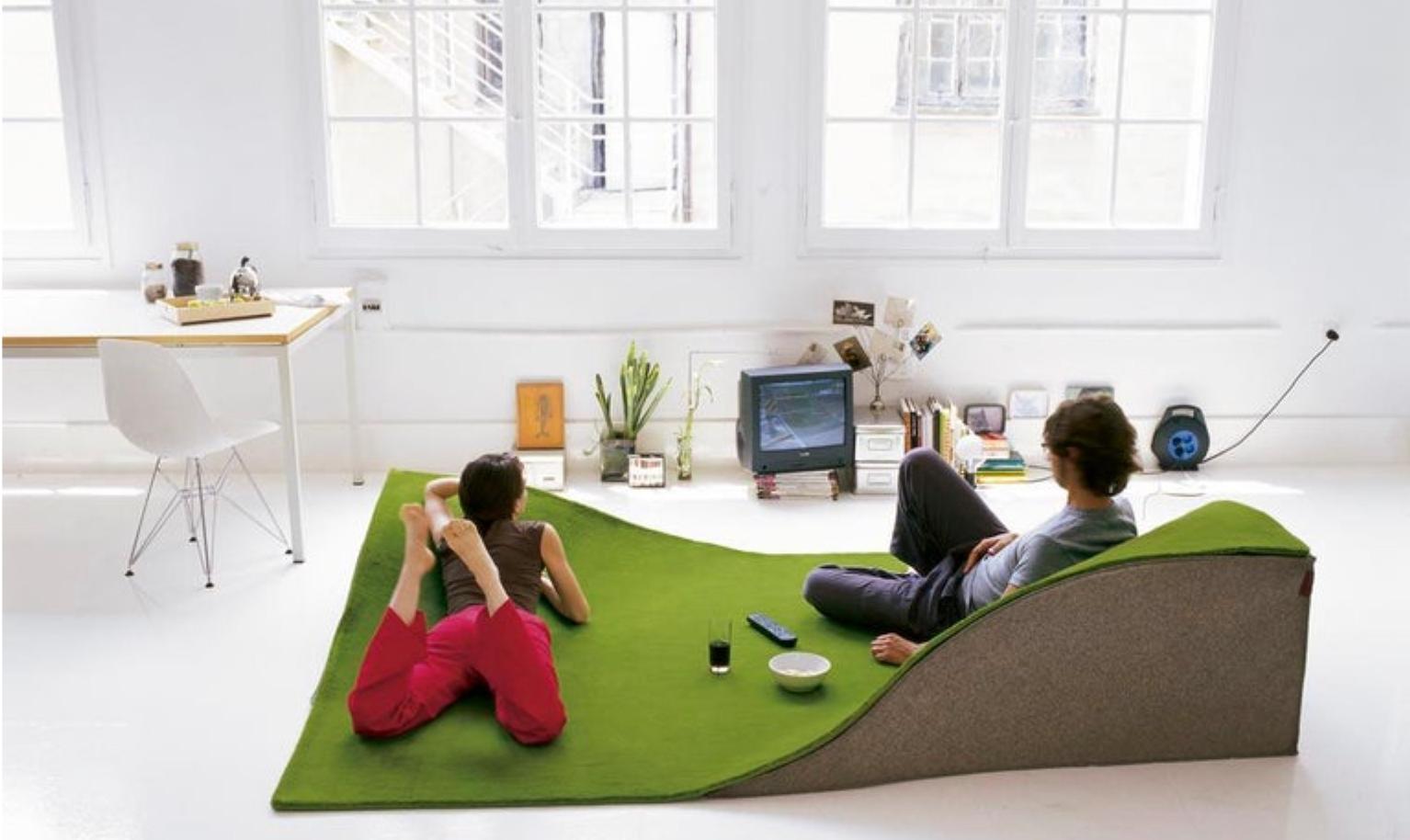 Flying carpet green rug, Nanimarquina, Ana Mir & Emili Padros, Modular seating. 2004. Exceedingly comfortable three-dimensional space to sit and stretch out. A domestic oasis. Any of the four corners can be raised with the grey felt wedges, creating