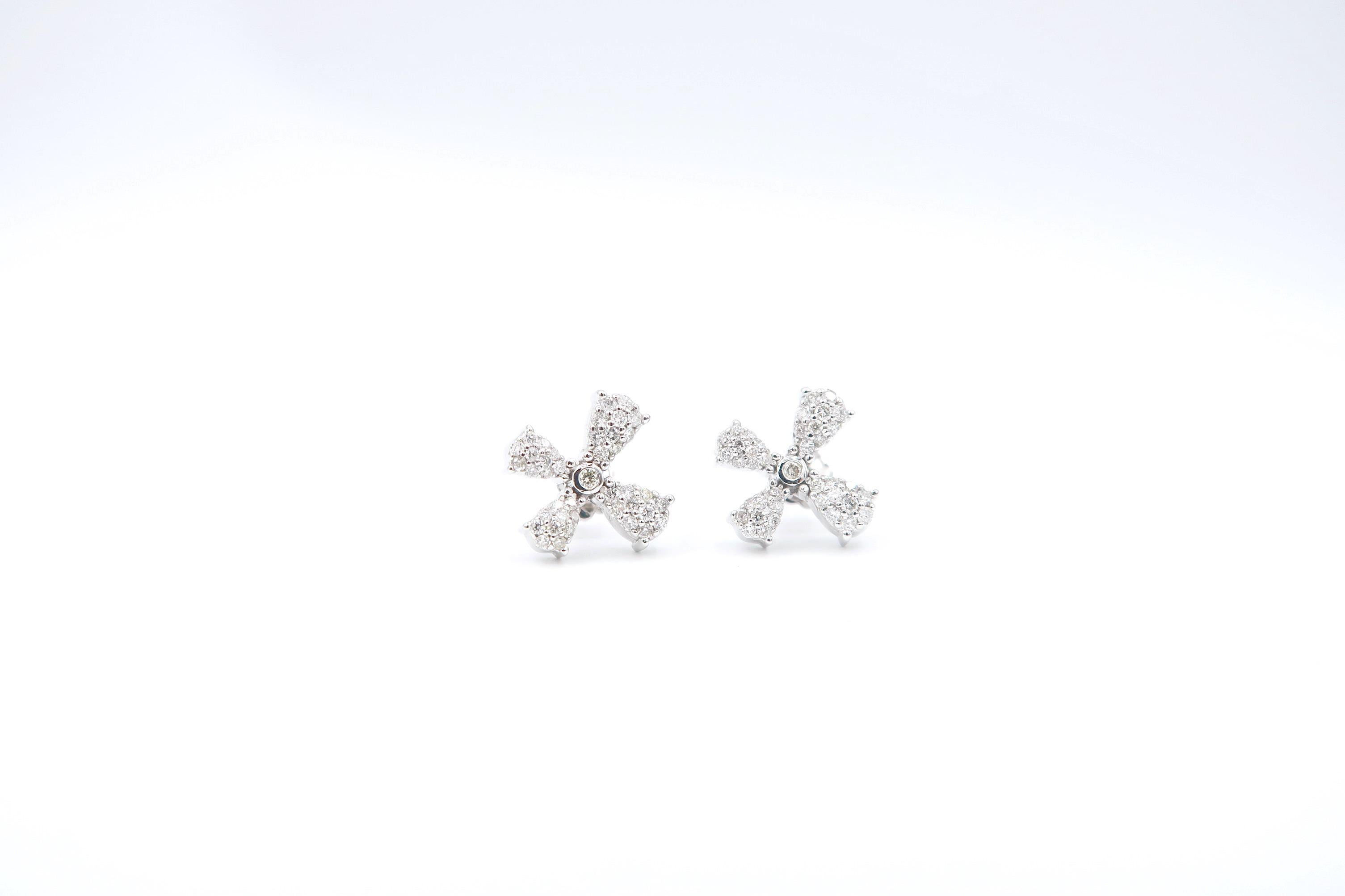 Flying Dandelion Seed Diamond Earrings in 18K White Gold

Diamond: 0.80ct.
Gold: 18K Gold 5.56g.