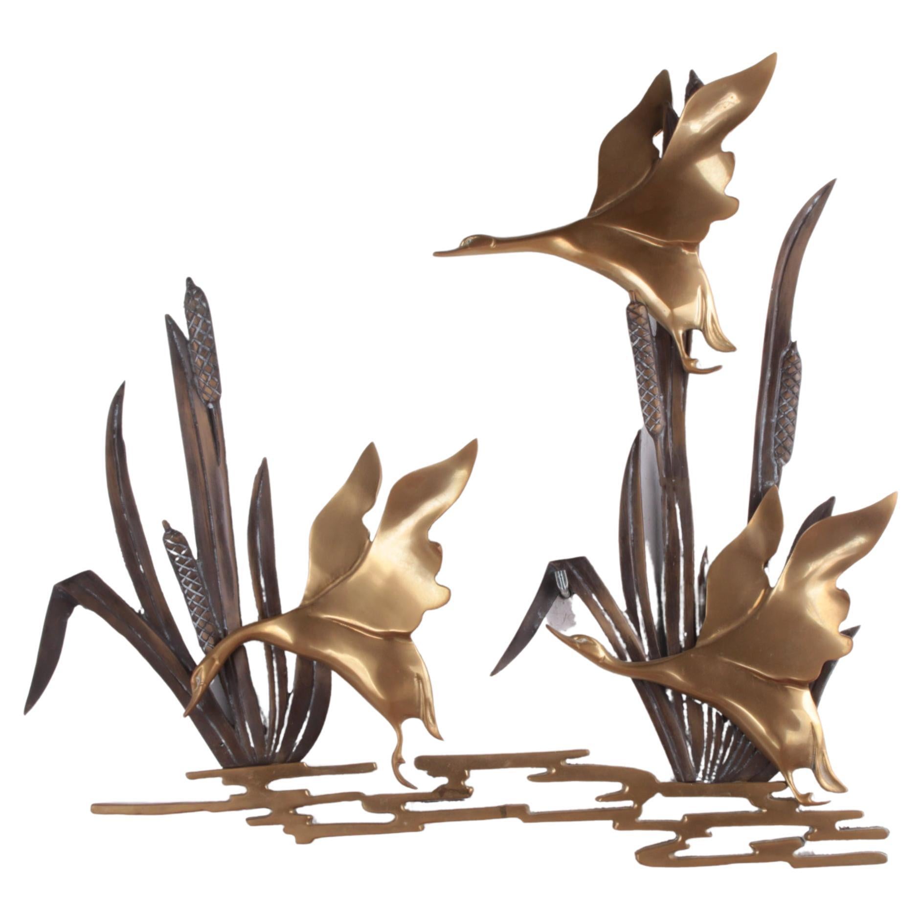 Flying Ducks from the Reeds Made of Copper