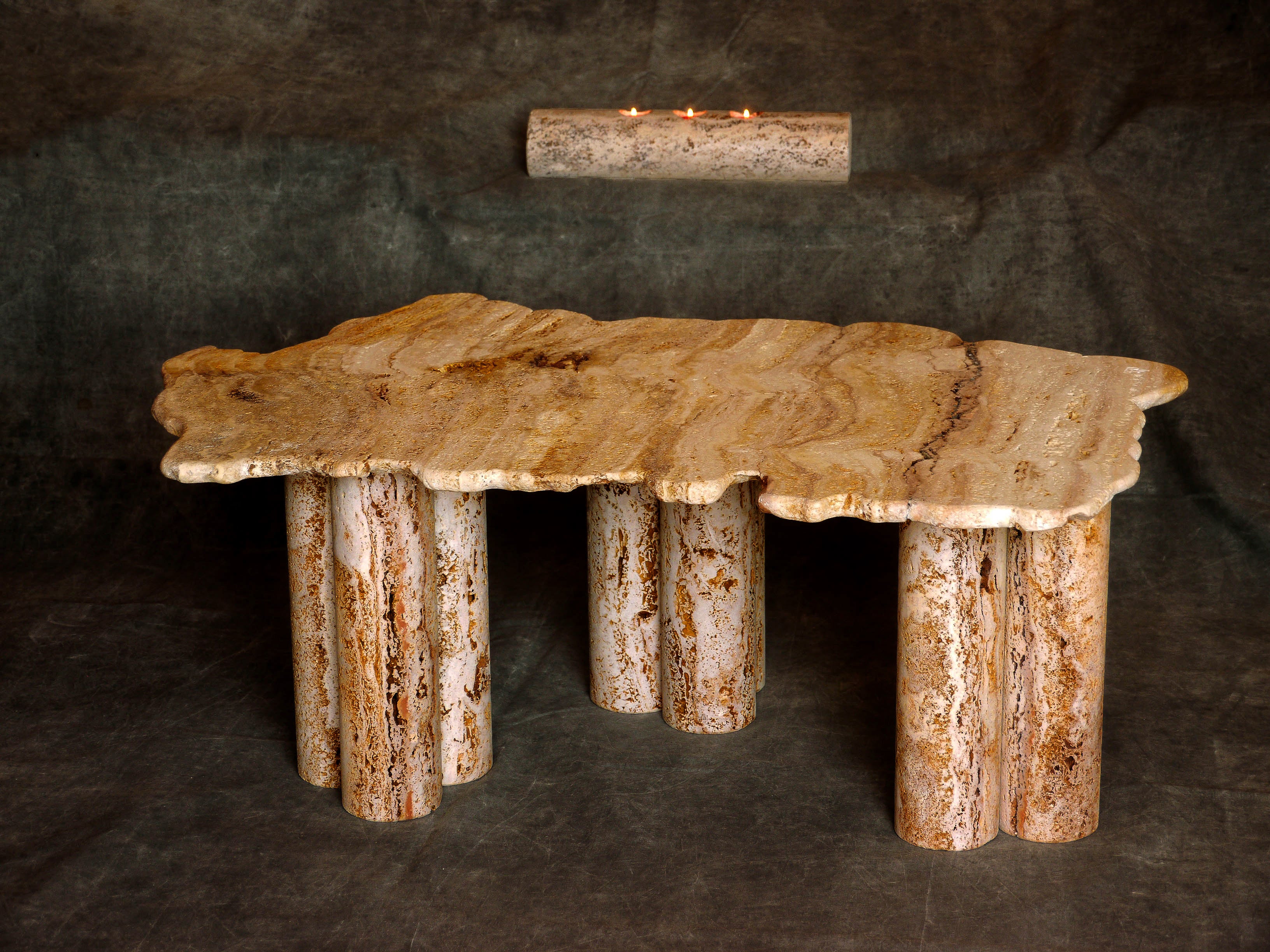 Flynn Stone coffee table by Jean-Fréderic Bourdier
Dimensions: D 99 x W 66 x H 37 cm
Materials: Travertine.

Mostly guided by his sculptor skills JFB and his life time strong attraction for nature, has started out this collection in 2021 as he