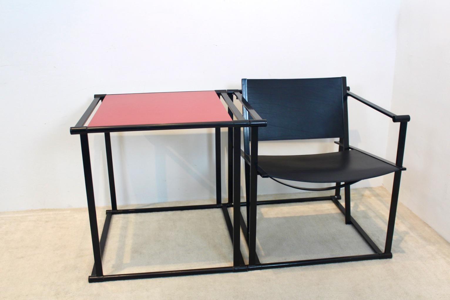 FM62 Cubic chair designed by Radboud van Beekum for Pastoe the Netherlands in the 1980s. The Chair comes with a black lacquered square metal frame with the back and seat in strong black Saddle Leather, very good. The Cubic Table comes with a black