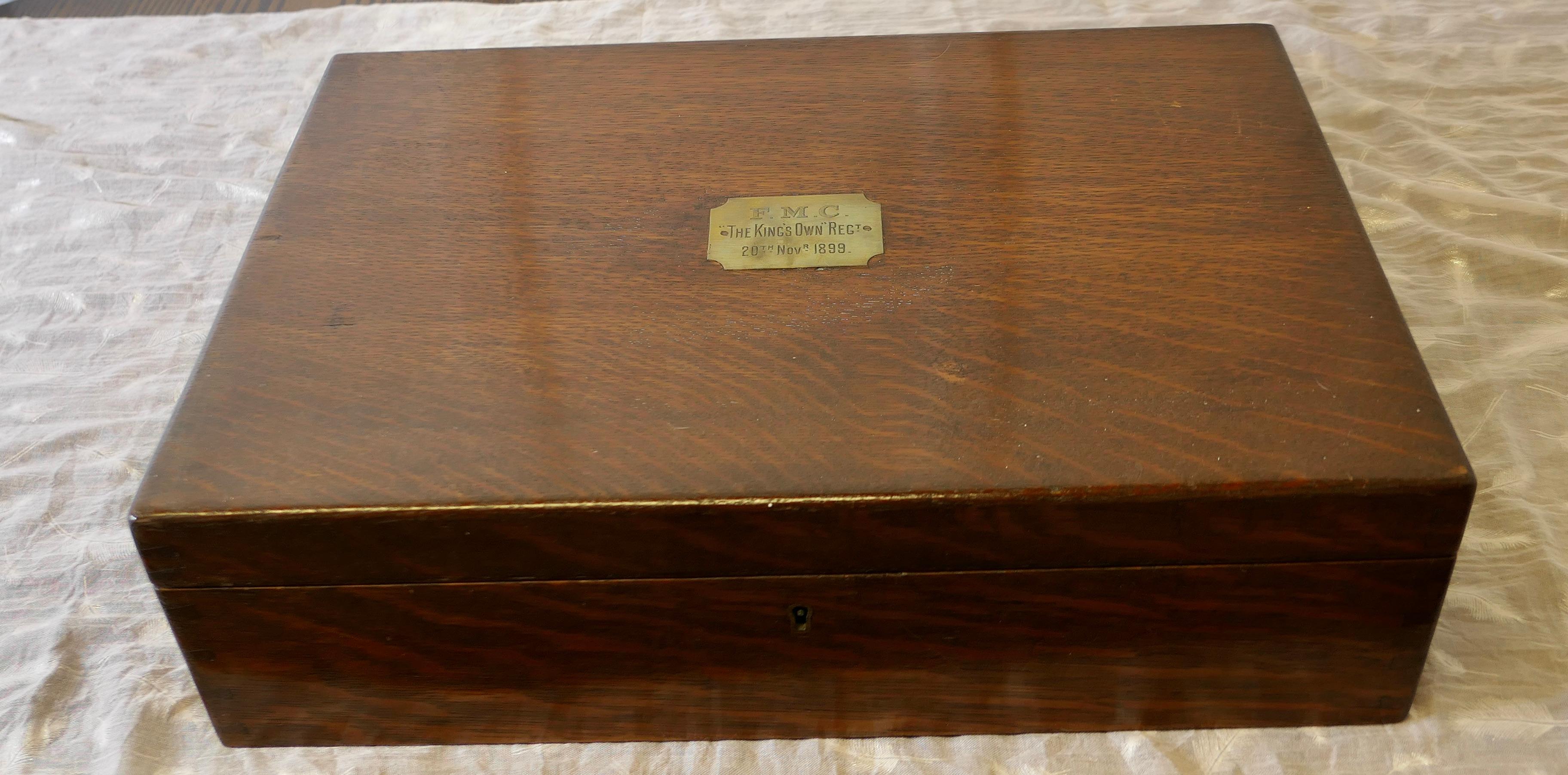 FMC “the King’s Own” Regiment 20th November 1899, Presentation Box

A superb quality piece, probably a cutlery canteen as it has an Elkington label on the inside, the box and the internal tray have never been used, it is made in oak and has very