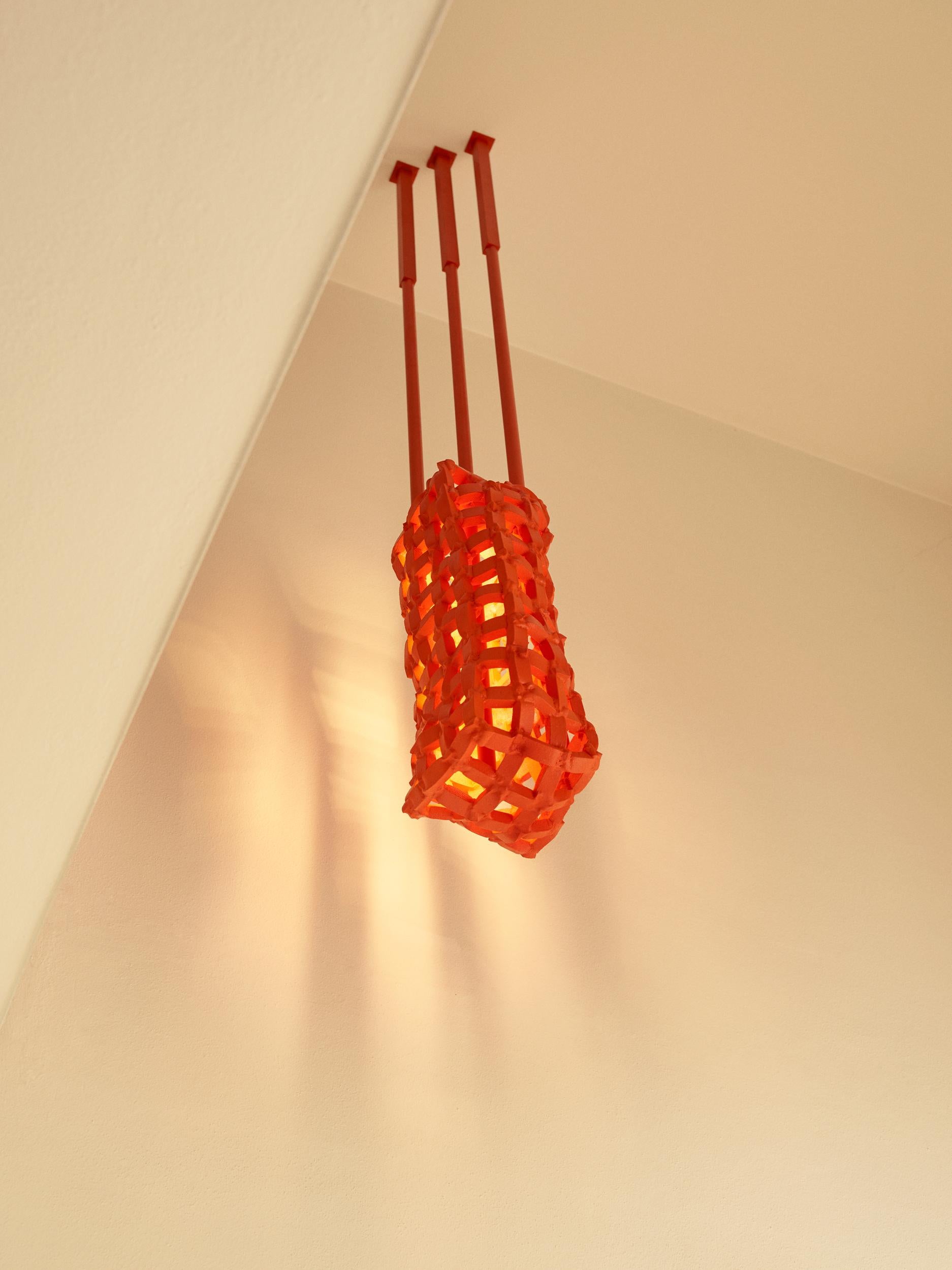 Foam Catcher_Ceiling Light_2 is Presented by Anton Hendrik Denys

The Foam Catcher_Ceiling Light_2 is a vertical hanging ceiling lamp made out of a rubber-coated foam lampshade that’s being supported by two metal hanging bars at opposite corners of