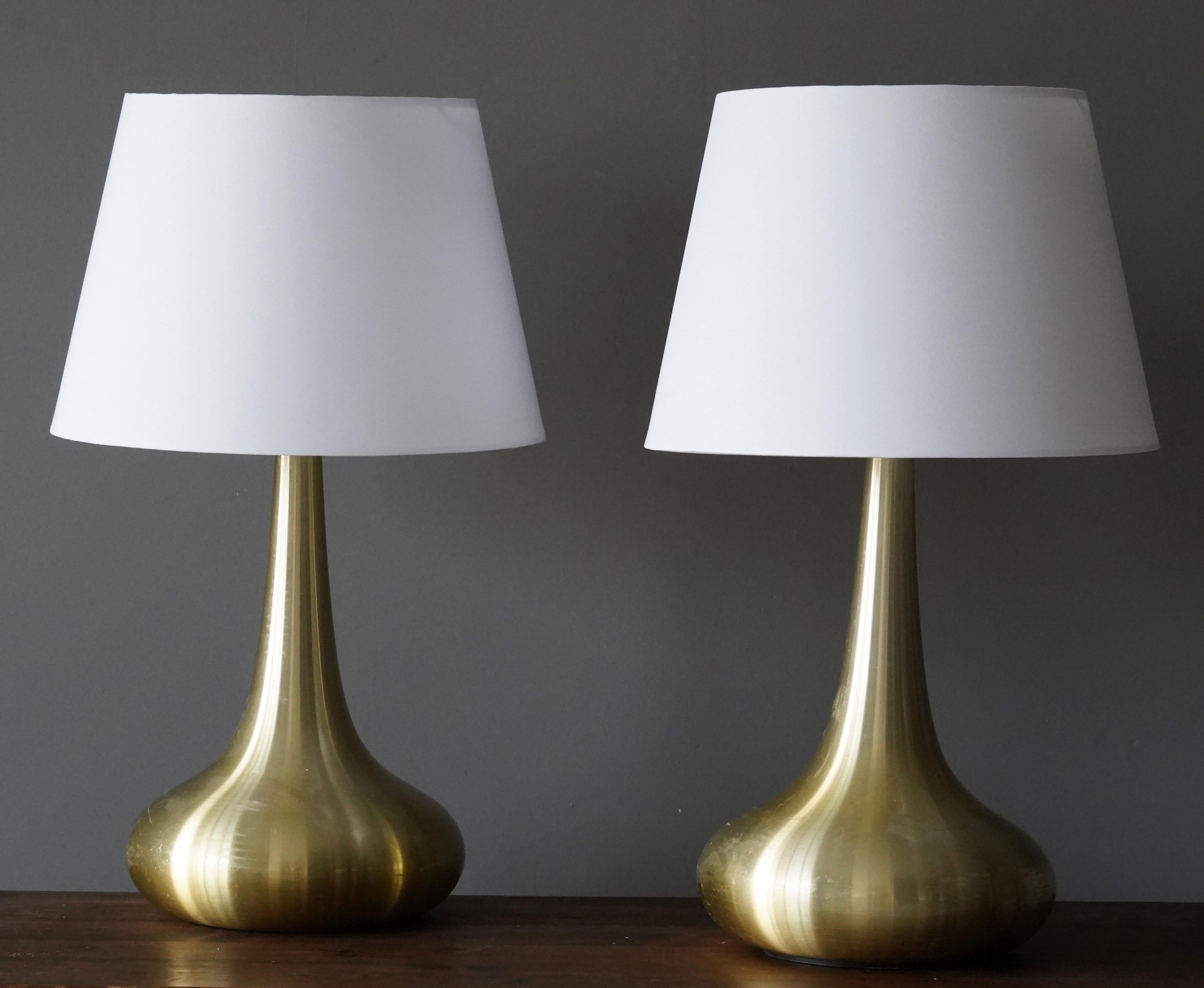 A set of two large table lamps. Designed and produced by Fog & Morup, Denmark, 1960s. Stamped. Sold without lampshades.

 