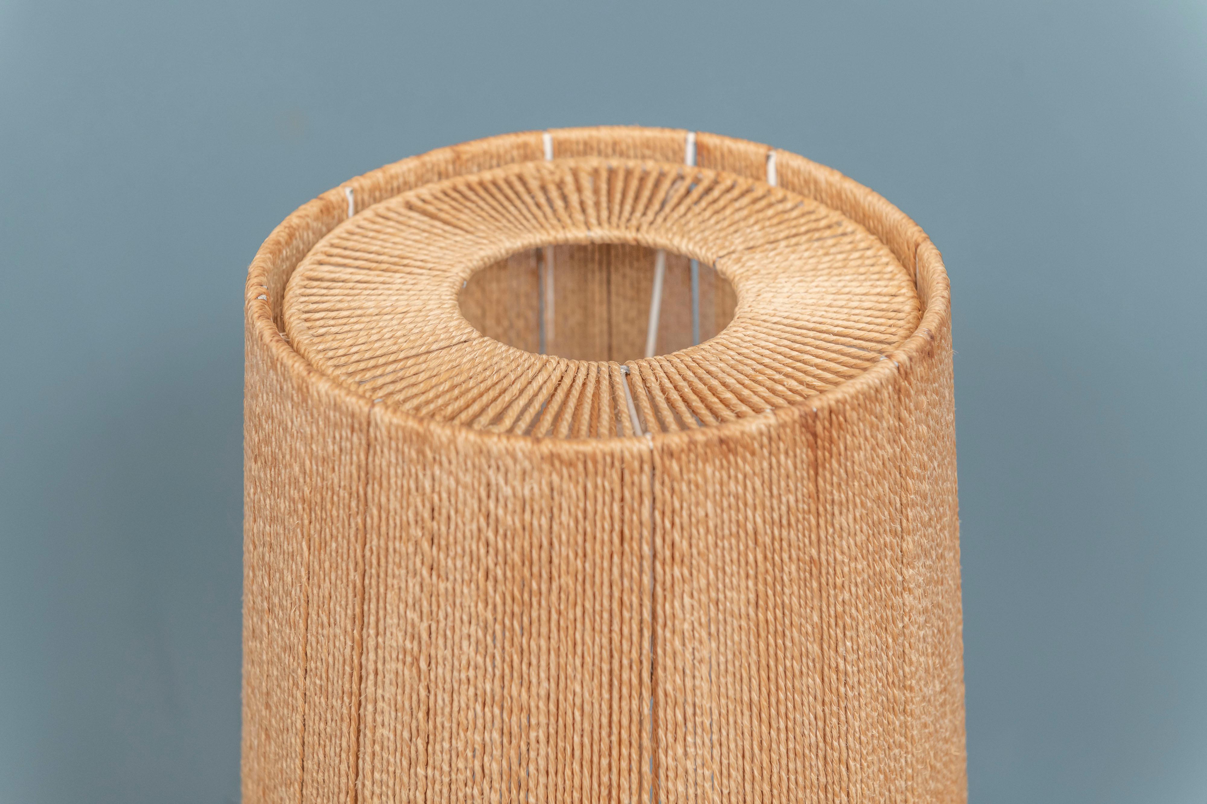 Fog & Morup turned teak table lamp with its original jute woven shade, Denmark.