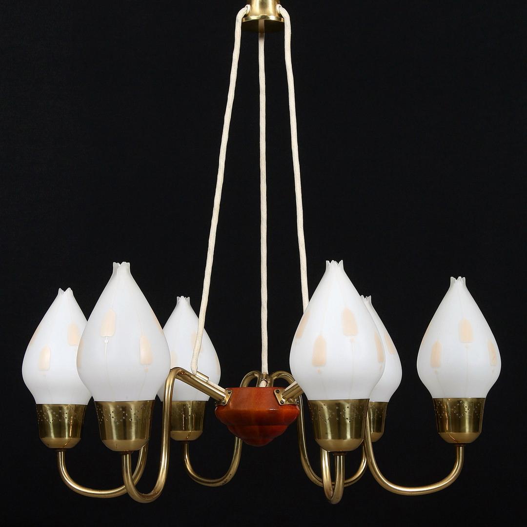 Brass construction with six Opaline glass globes fitted with E14 bulbs.
Made by Fog and Mørup in the 1950s in Denmark.
 