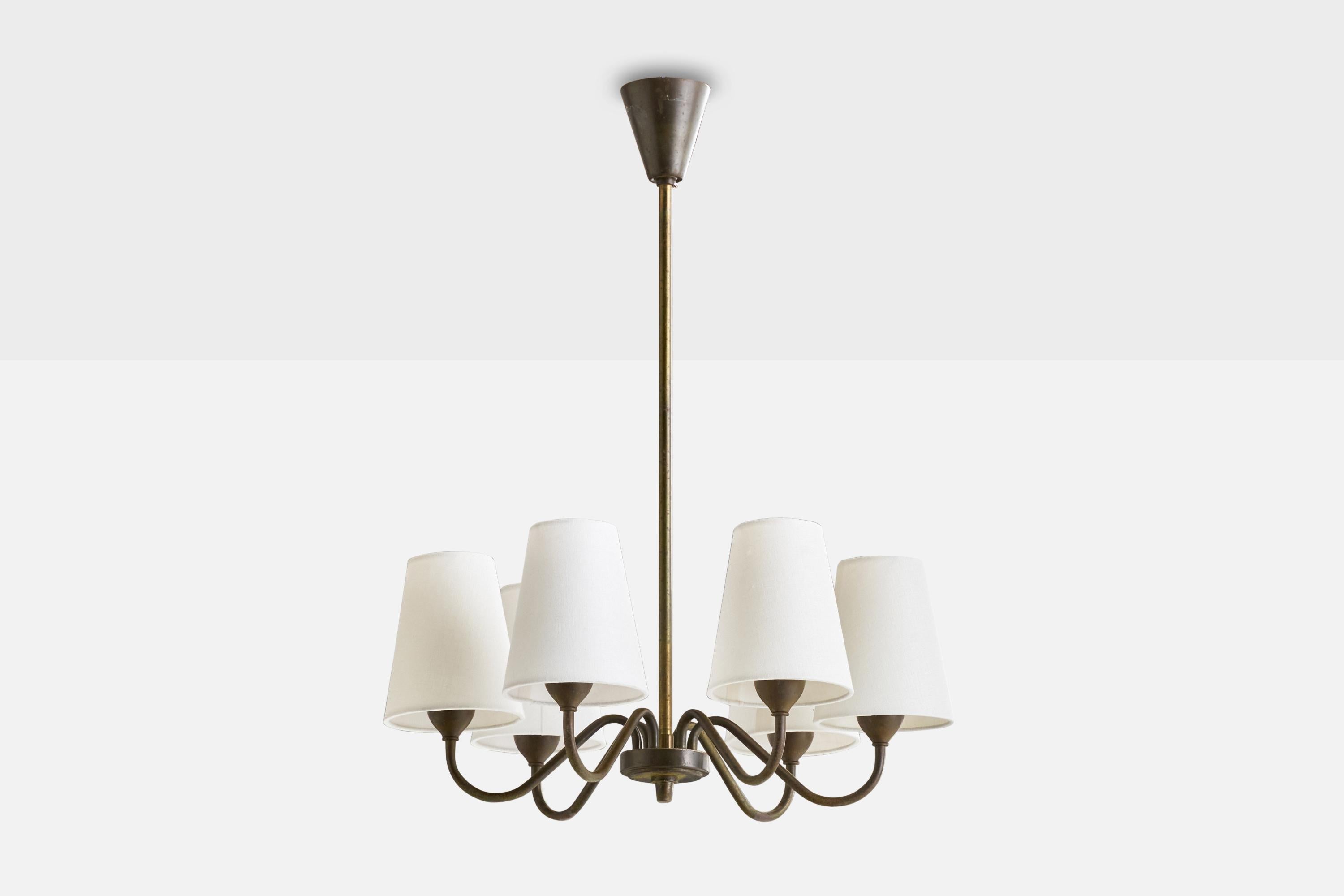 A brass and white fabric chandelier designed and produced by Fog & Mørup, Denmark, 1940s.

Dimensions of canopy (inches): 3.5” H x 3.25” Diameter
Model originally mounted with glass difussers.
Socket takes standard E-14 bulbs. 6 sockets.There is no