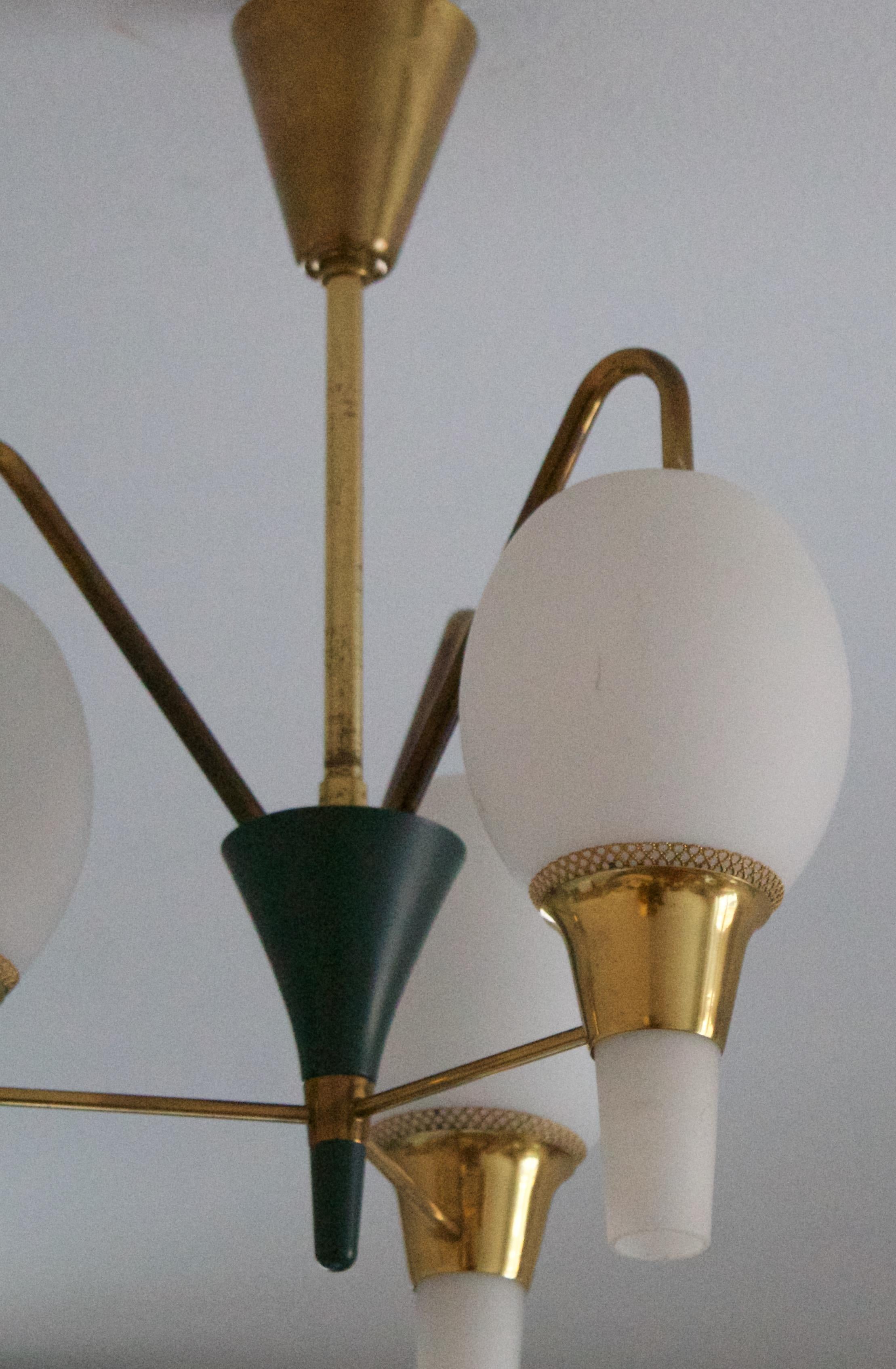 A chandelier light, designed and produced by Fog & Mørup, Denmark, 1950s.

 