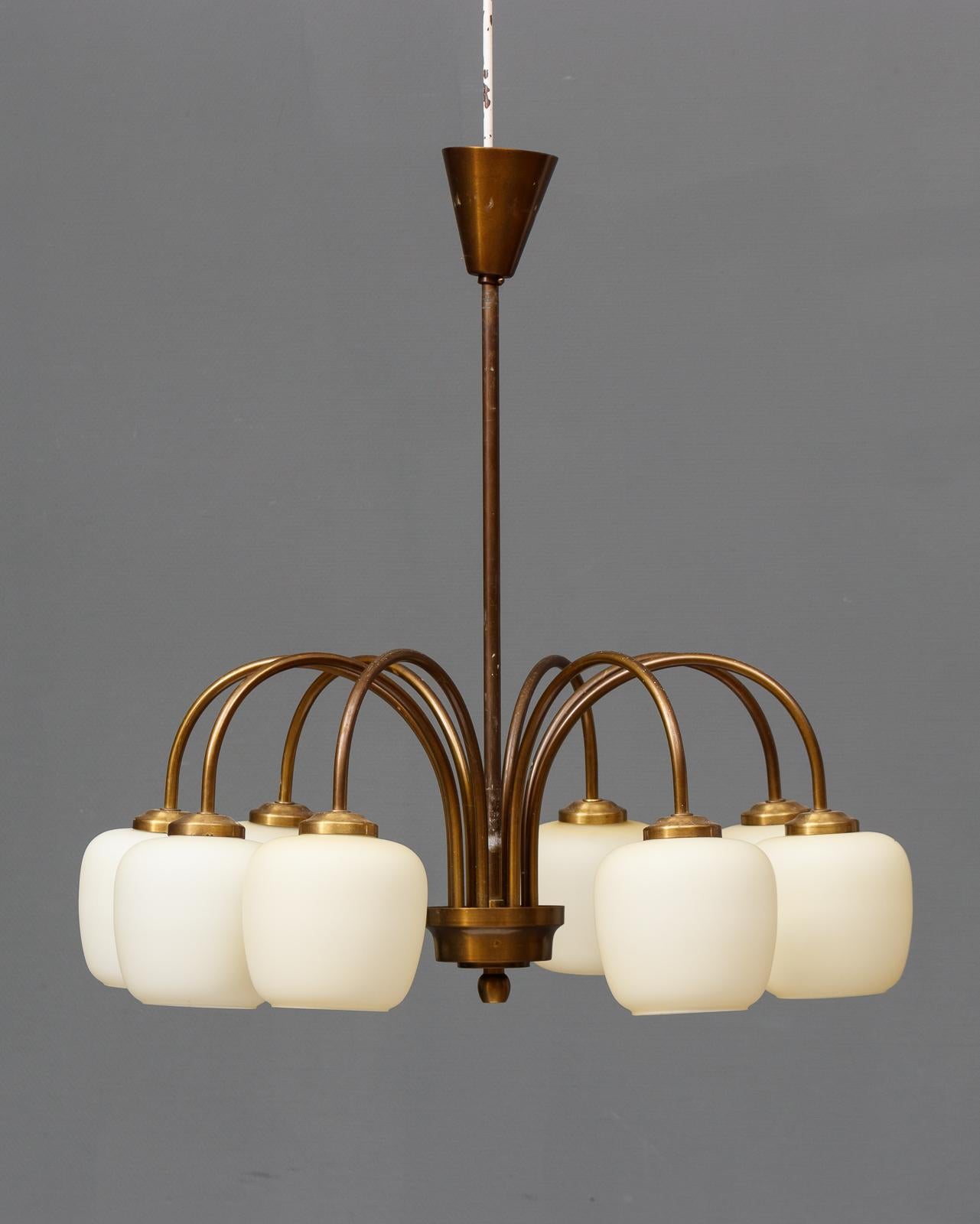 The company started as an agent and wholesaler business in Aarhus, and in 1906, the company moved to Copenhagen, and began specializing in lighting. Opening their first factory on 1 April 1915, at Nørregade 7, and by starting up production of lamps