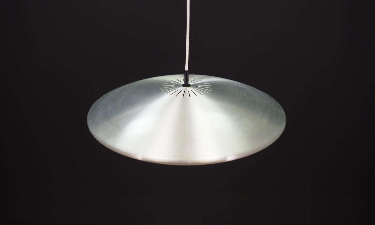Fantastic lamp from the 1960s-1970s, Scandinavian design. Manufactured by Fog & Mørup. Construction is made of metal. Maintained in good condition (minor bruises and scratches), directly for use.

Dimensions: Height 10 cm, diameter 48 cm.