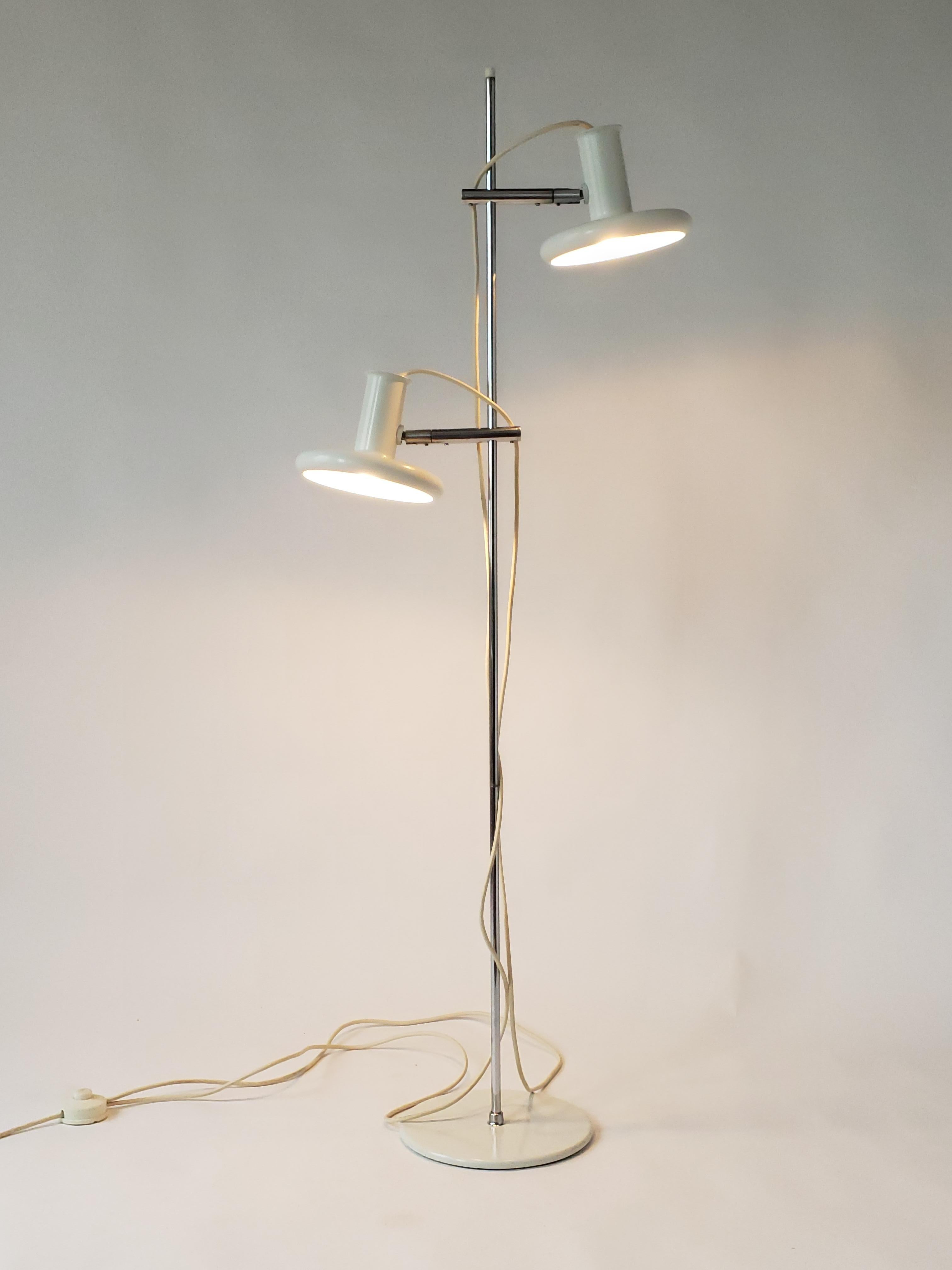 Danish iconic Minimalist modern floor lamp.

Shades slide up and down anywhere on chrome pole and pivot in all direction.

Well made and sturdy hardware.

Height is 56 inches, base of lamp is 10 inches wide.

Ceramic E27 socket rated 60 watt