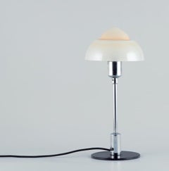 Fog & Mørup. Table lamp with a "Spejlæg"(Fried Egg) glass shade.
