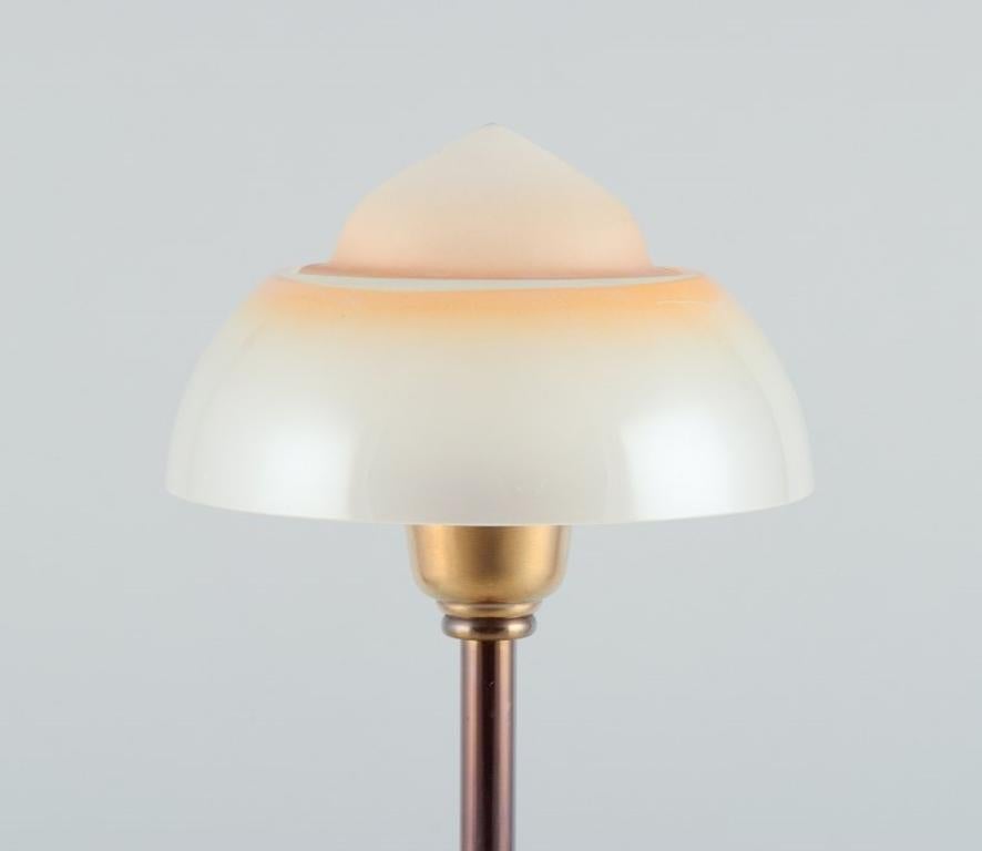 Scandinavian Modern Fog & Mørup. Table lamp with stem in patinated brass and 'Fried Egg' glass shade For Sale