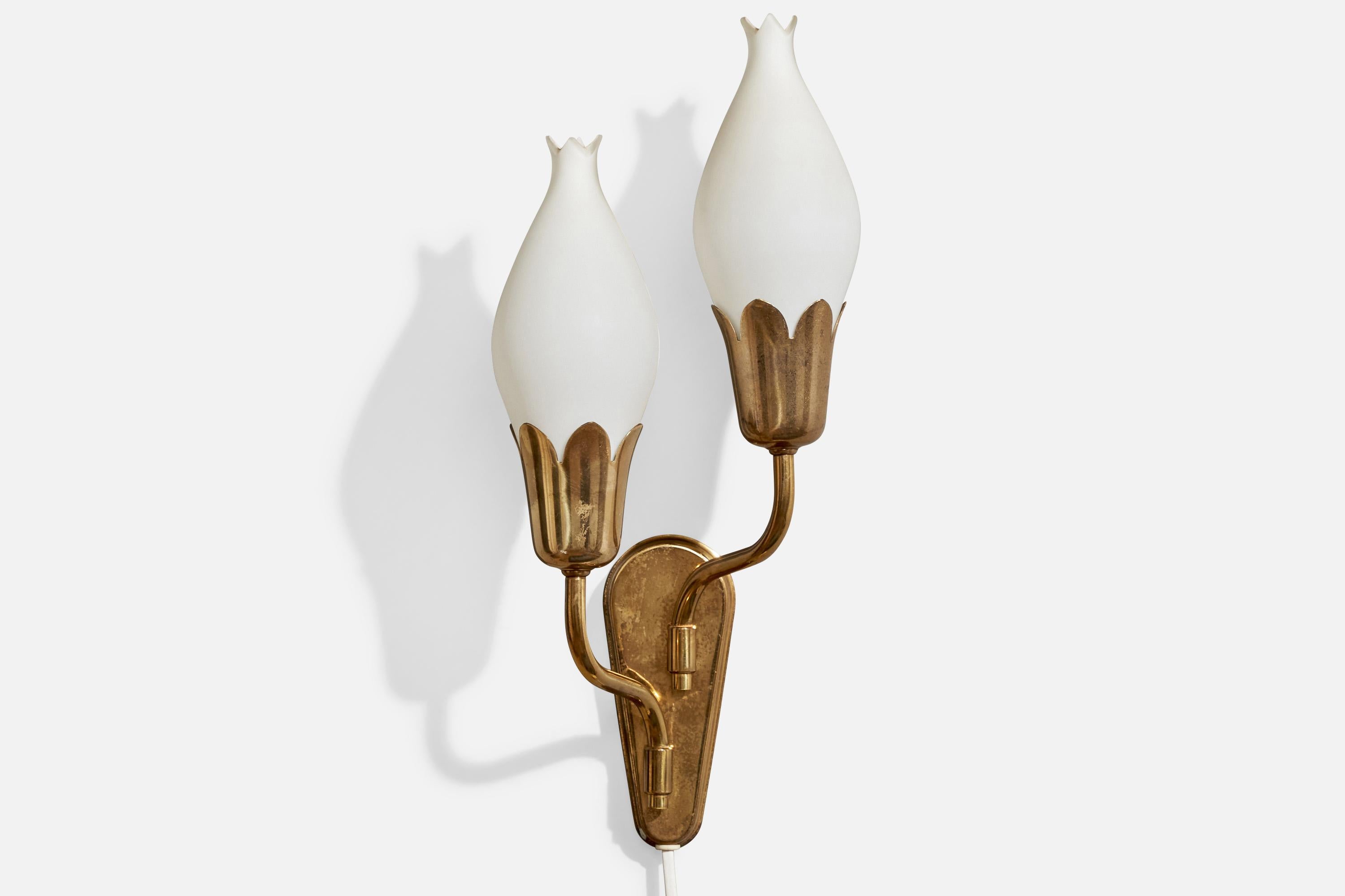 A brass and white opaline glass wall light, designed and produced by Fog & Mørup, Denmark, c. 1950s. 

Overall Dimensions (inches):  16” H x  6.5” W x  5.75” D

Back Plate Dimensions (Inches):  6” H x 2.5” W x .75” D

Bulb