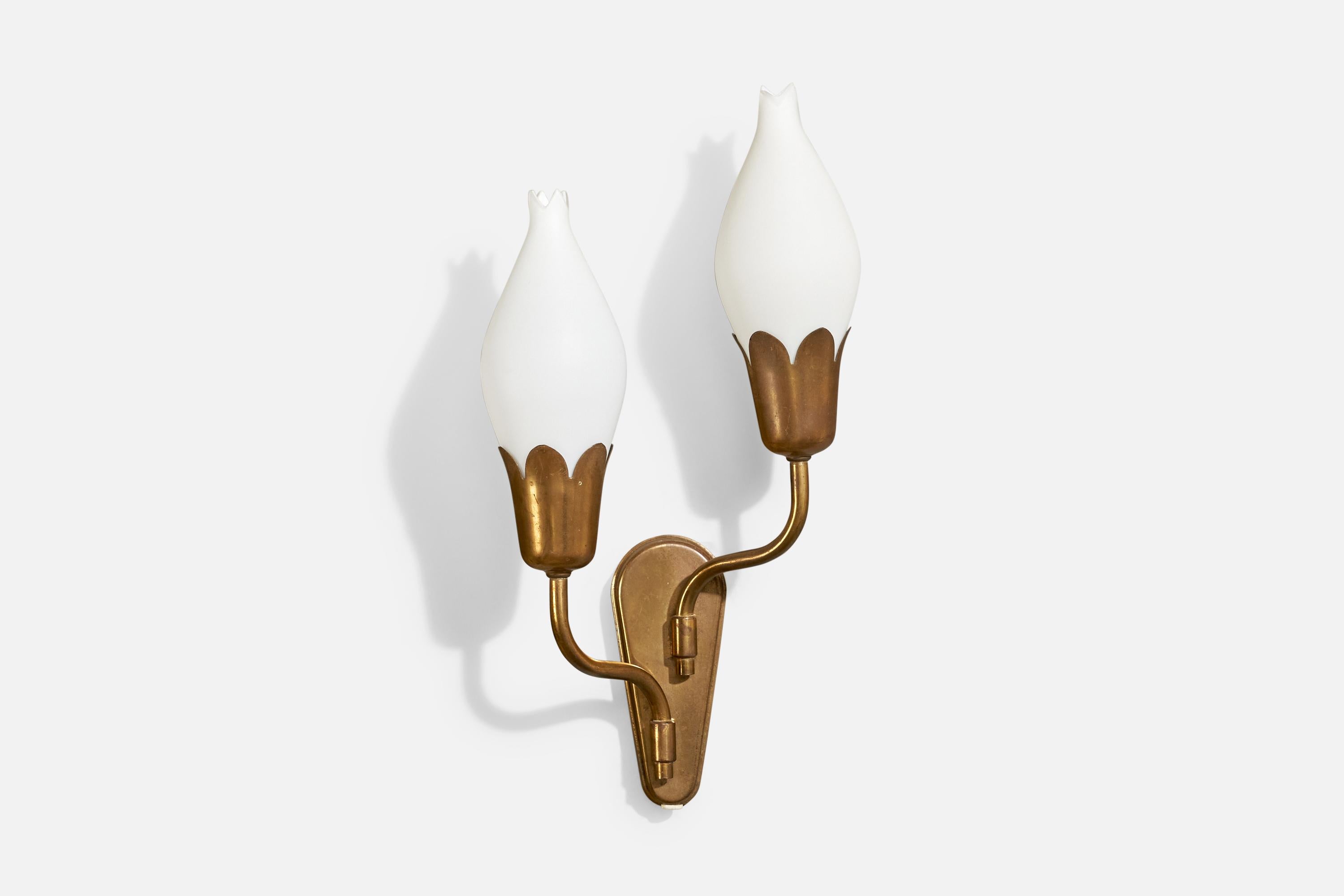 A brass and white opaline glass wall light, designed and produced by Fog & Mørup, Denmark, c. 1950s. 

Overall Dimensions (inches): 16” H x 8” W x 4.2“ D

Back Plate Dimensions (Inches): 6” H x 2.5” W x .75” D

Bulb Specifications: E-14

Number of