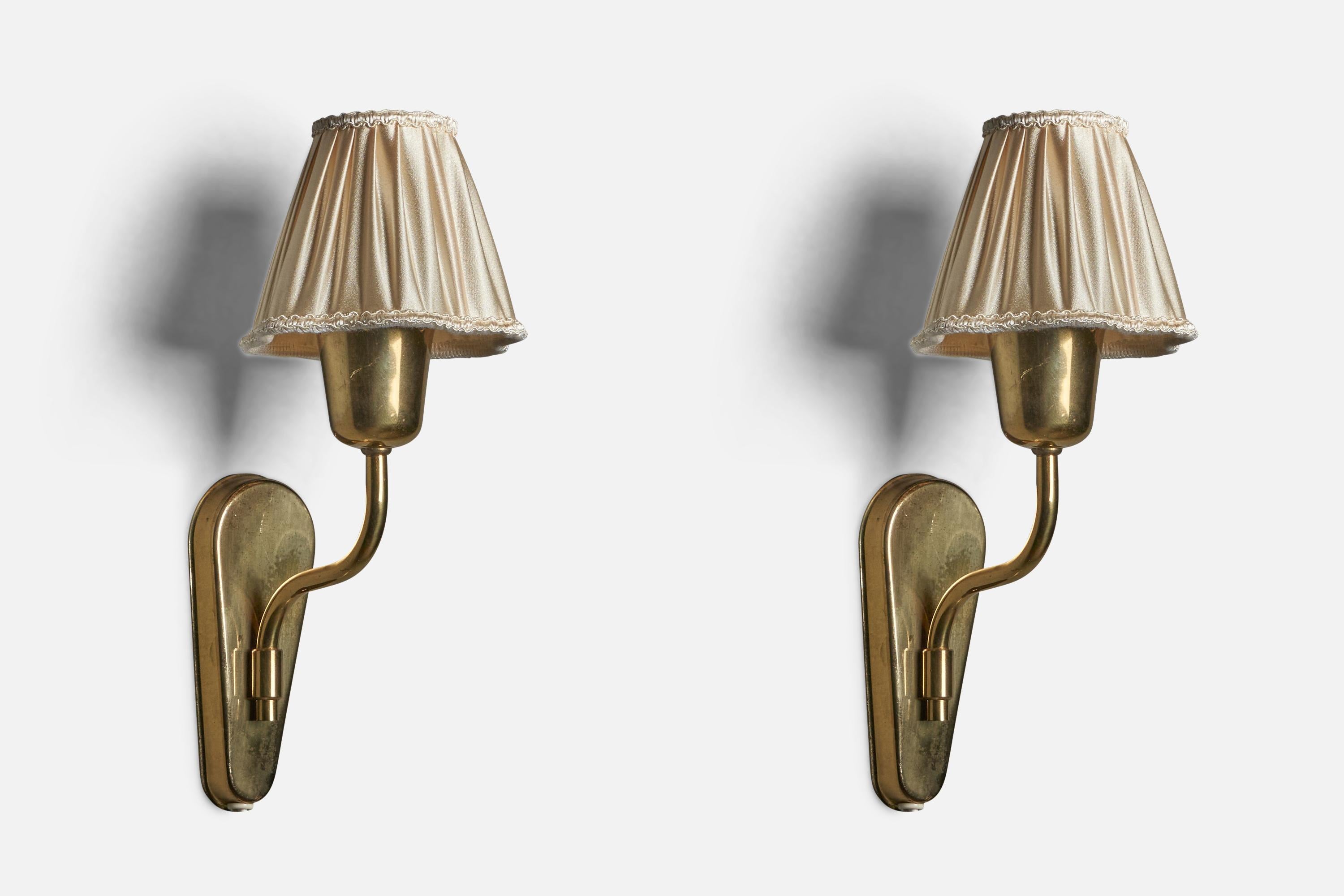 A pair of wall lights designed and produced by Fog & Mørup, Denmark, c. 1950s.

Overall Dimensions (inches): 12” H x 5.25” W x 6.25” D
Bulb Specifications: E-14 Bulb
Number of Sockets: 1