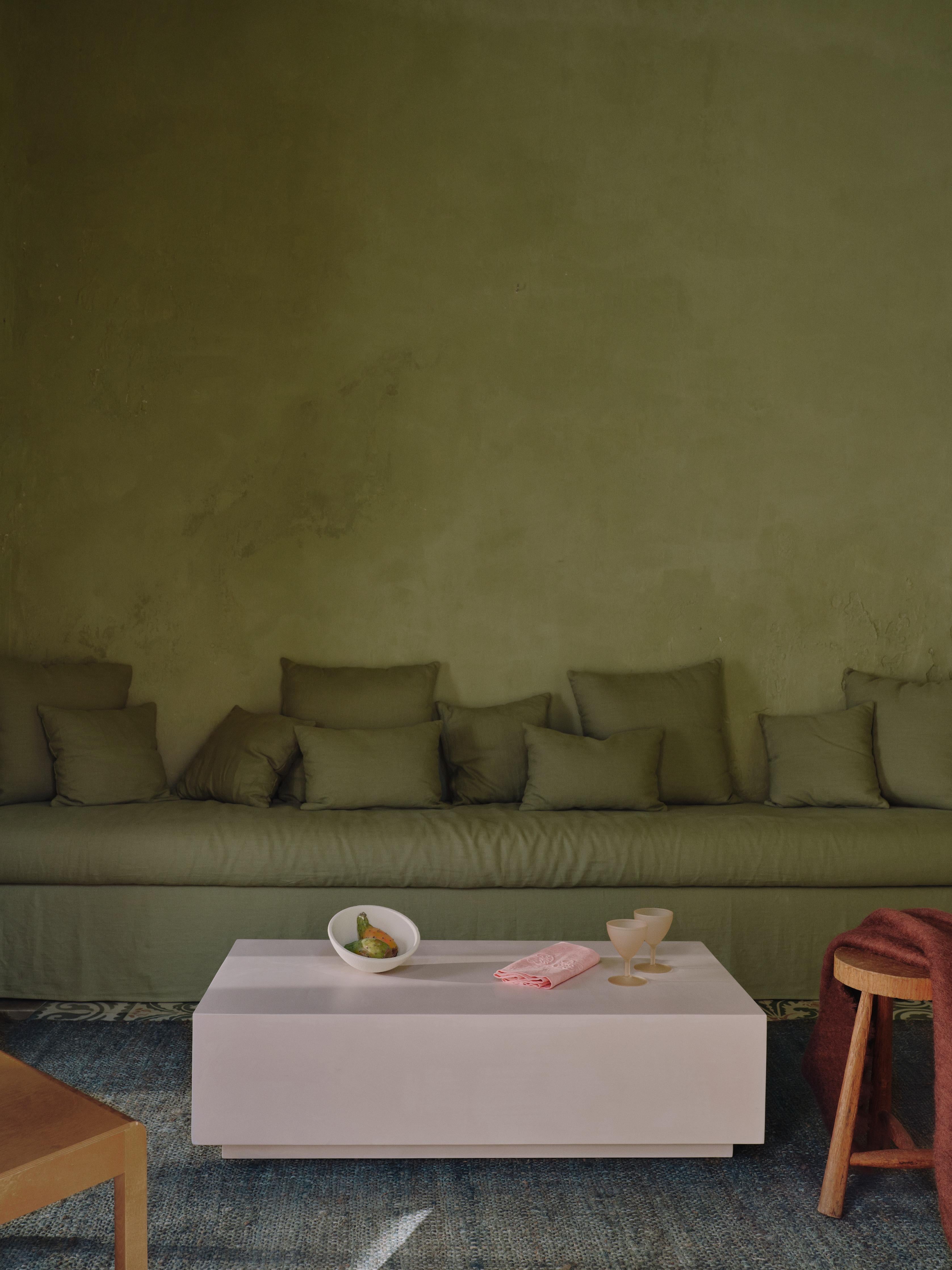 Handcrafted in Spain by expert artisans, this oval-shaped dining table from Marlot Baus combines timeless design with modern craftsmanship. Each piece is carefully made using our signature microcement technique, layered by hand to achieve a smooth,