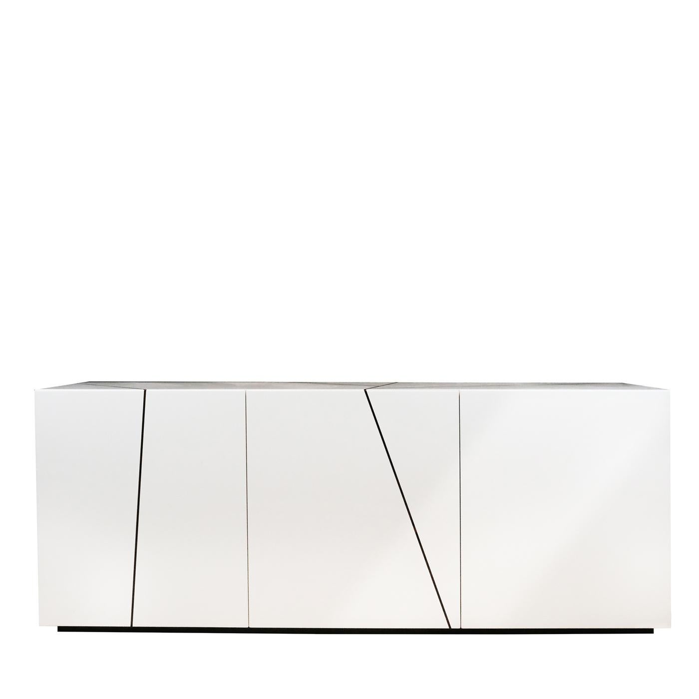 Minimalist sophistication characterizes this splendid sideboard. Marked by essential, geometric lines, it is fashioned of wood finished with a glossy cream polyurethane lacquer. It is composed of three doors enriched with straight, geometrical