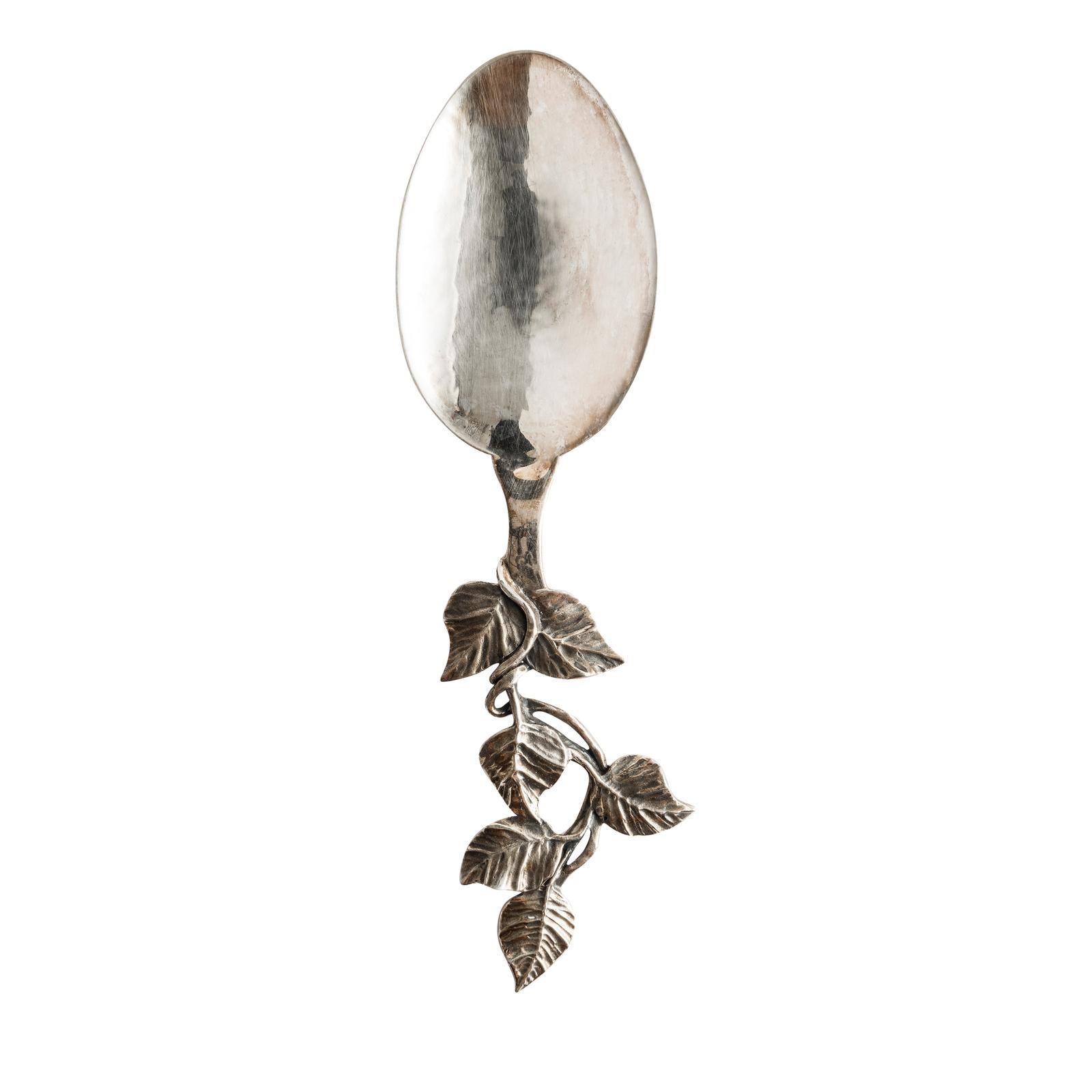 This exquisite sterling silver tablespoon was handmade by Osanna Visconti using the technique of lost-wax casting. The handle of this spoon is a veritable sculpture, featuring delightfully-crafted undulating leaves, contrasting in size with the