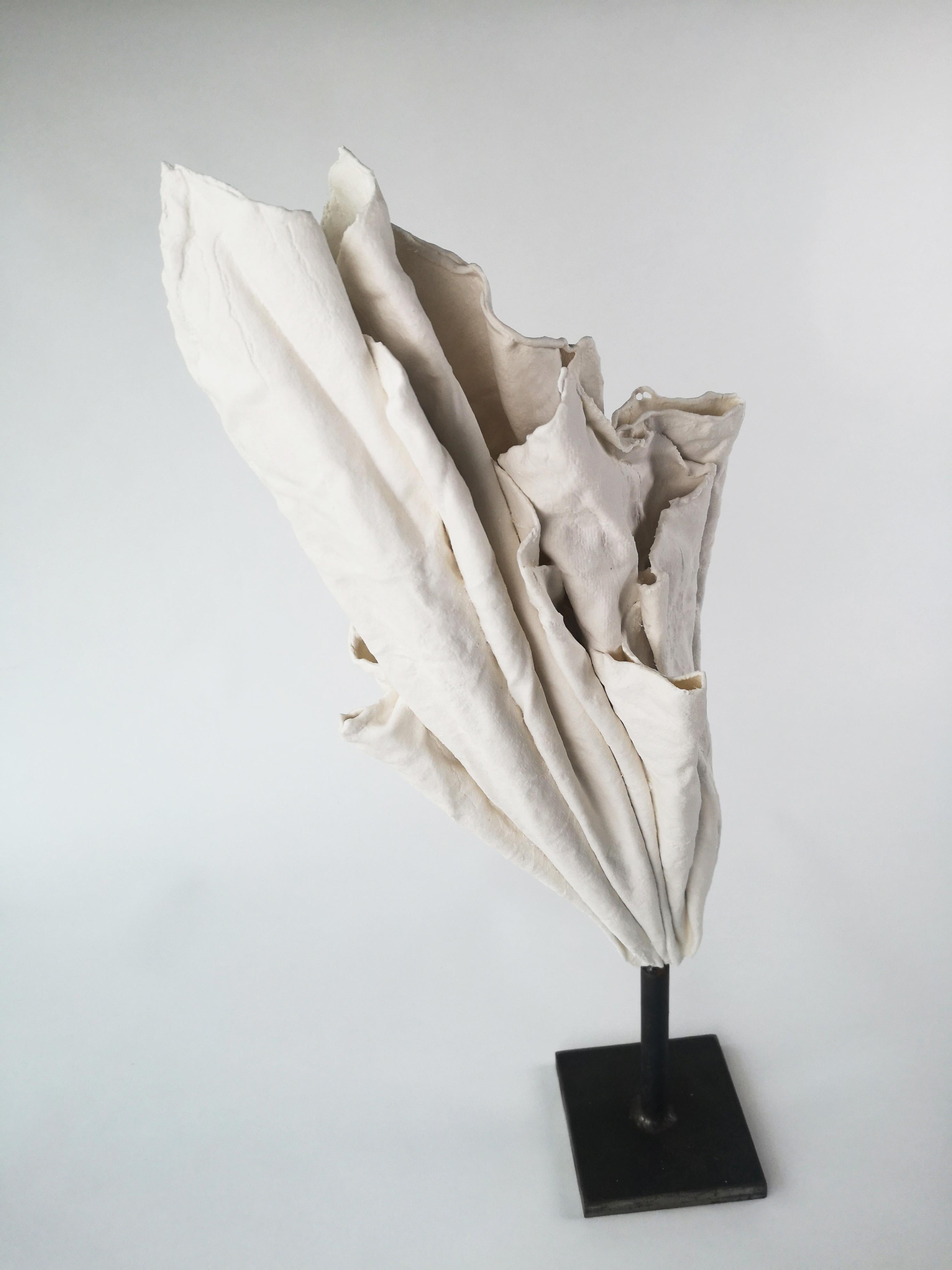 Fold III Sculpture by Dora Stanczel
One of a Kind.
Dimensions: D 14 x W 20 x H 60 cm.
Materials: Porcelain and beton pedestal.

I create bespoke and luxurious porcelain pieces with a careful aesthetic. Beyond the technical mastery of casting, what
