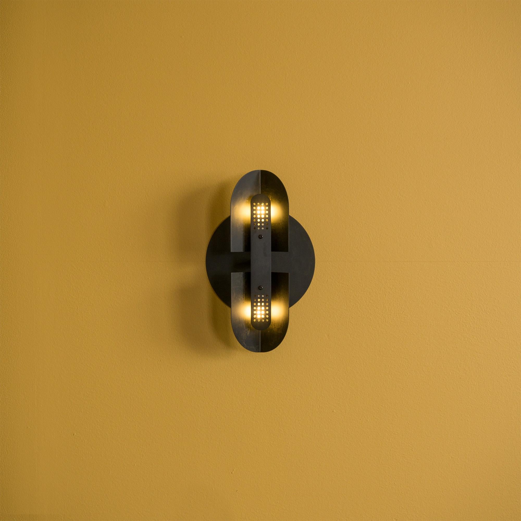 Canadian Fold Sconce in Perforated Black Patina by Simon Johns