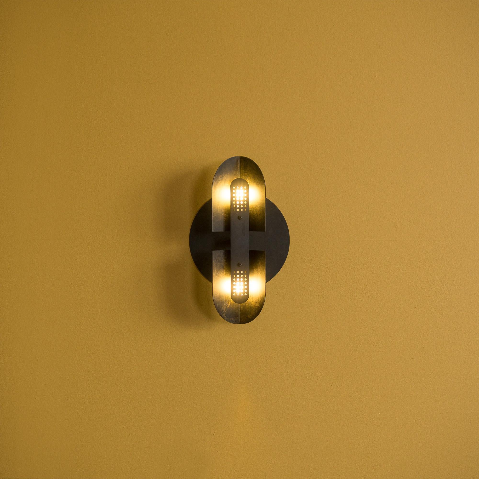 Patinated Fold Sconce in Perforated Black Patina by Simon Johns