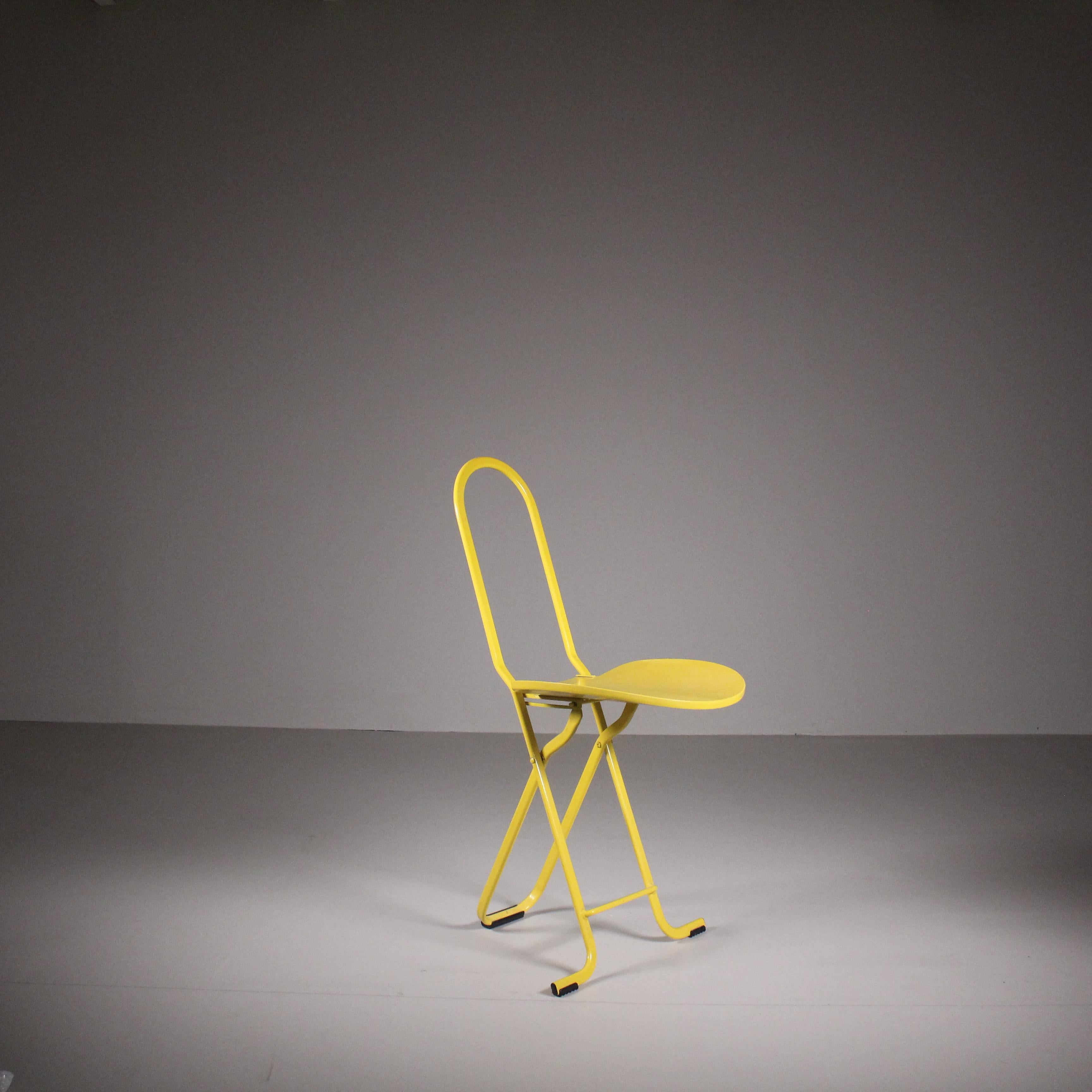 Foldable Chair Dafne, Gastone Rinaldi, Thema, 1970. The Dafne Foldable Chair, designed by Gastone Rinaldi in 1970 as part of the Thema collection, exudes timeless elegance and practicality. With its vibrant yellow hue, this chair adds a pop of color
