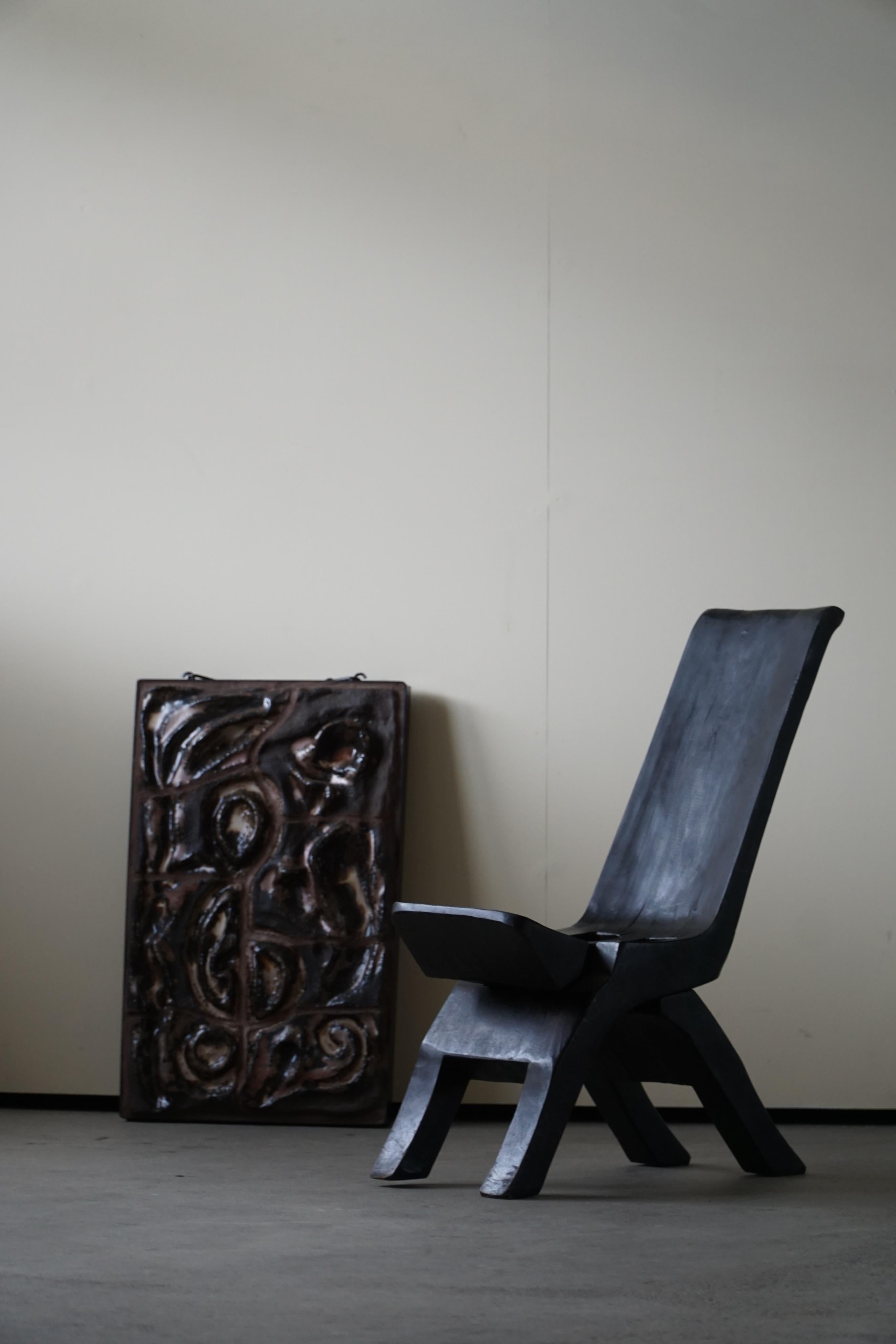 A fine foldable hand carved child chair in solid wood. Made in Asia in circa 1960s. A beautiful wabi sabi object with a Fine patina. Perfect as a decorative chair for modern interior.

