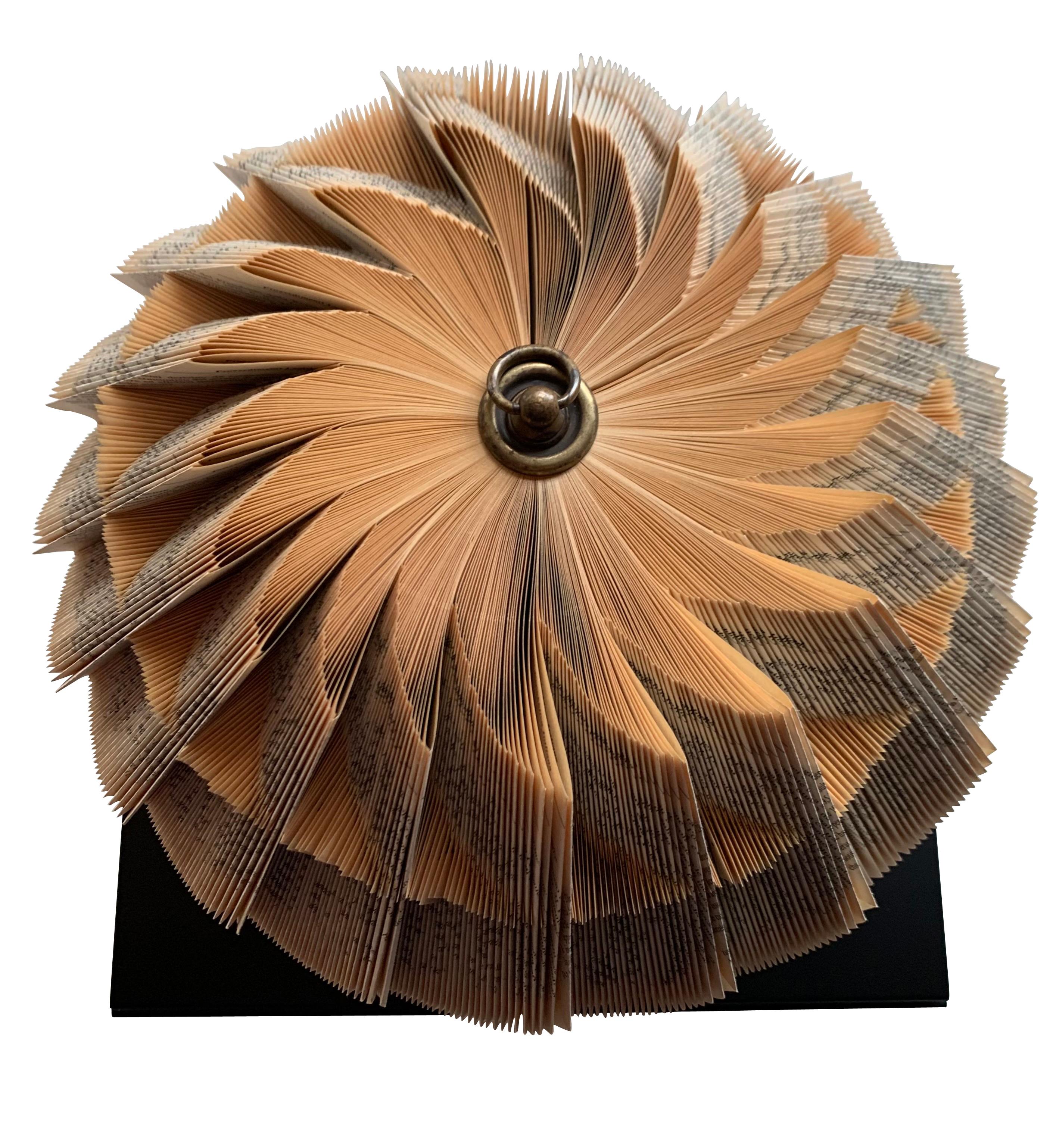 Contemporary Italian hand folded pages from vintage book to create decorative sculpture.
Circular shape.
Mounted on wood base.
Plexi box surround.
