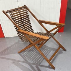 Folding adjustable steamer, deck or campaign rocking chair, circa 1920's