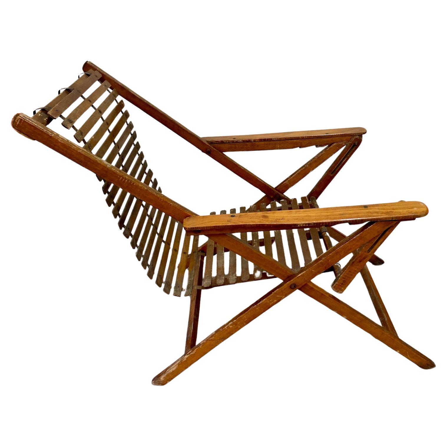 Folding adjustable steamer, deck or campaign rocking chair, circa 1920's For Sale