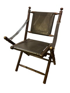 Folding campaign chair with leather