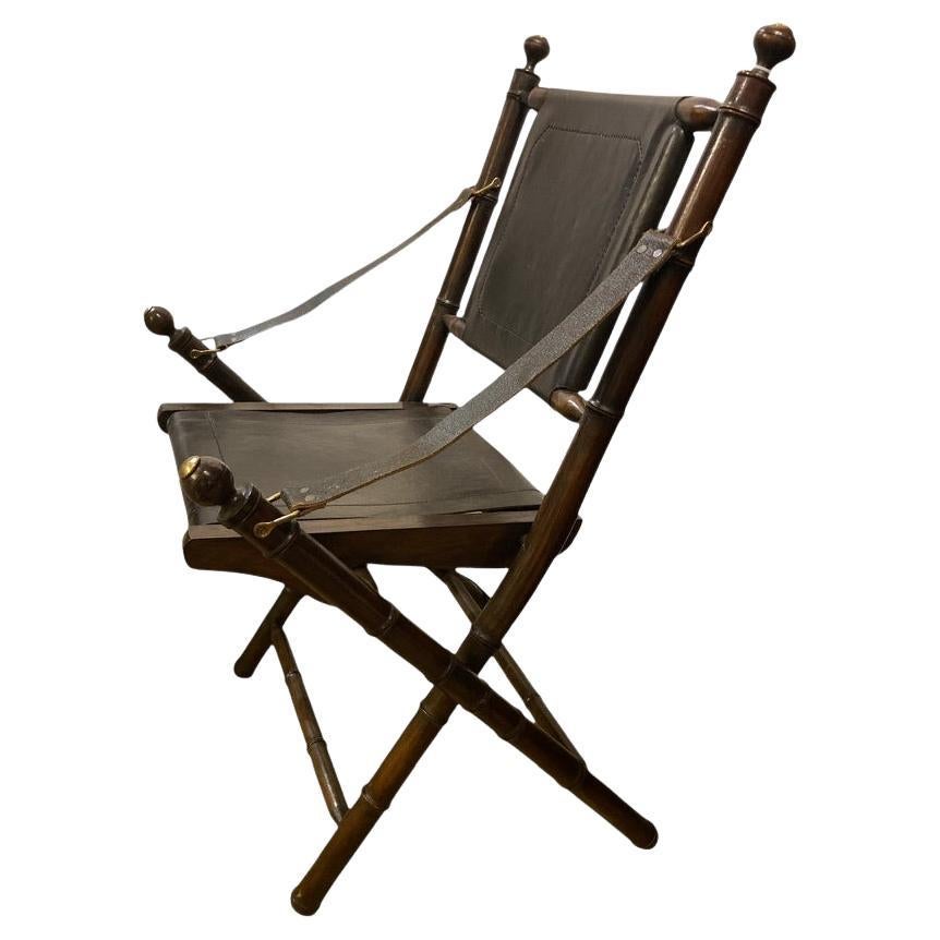Folding campaign chair with leather