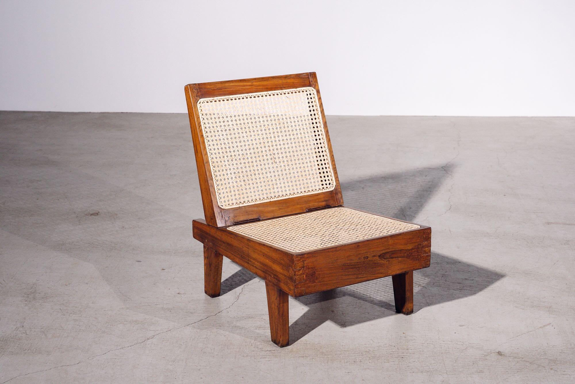An authentic mid-century piece from Pierre Jeanneret’s legendary Chandigarh commission. Teak frame with hand-woven bamboo-rattan seat & back.

Letter : CHD.ADMN. (Chandigarh Administration)