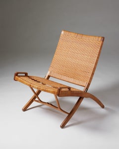 Folding chair model JH 512 designed by Hans J. Wegner for Johannes Hansen, 1949