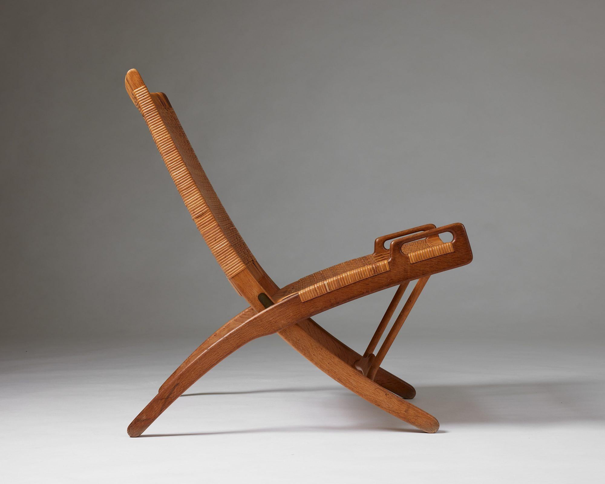 Mid-Century Modern Folding chair model JH 512 designed by Hans J. Wegner for Johannes Hansen, 1949 For Sale