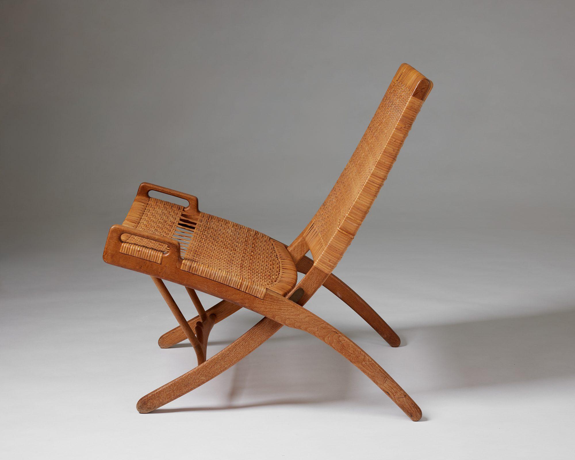 Cane Folding chair model JH 512 designed by Hans J. Wegner for Johannes Hansen, 1949 For Sale
