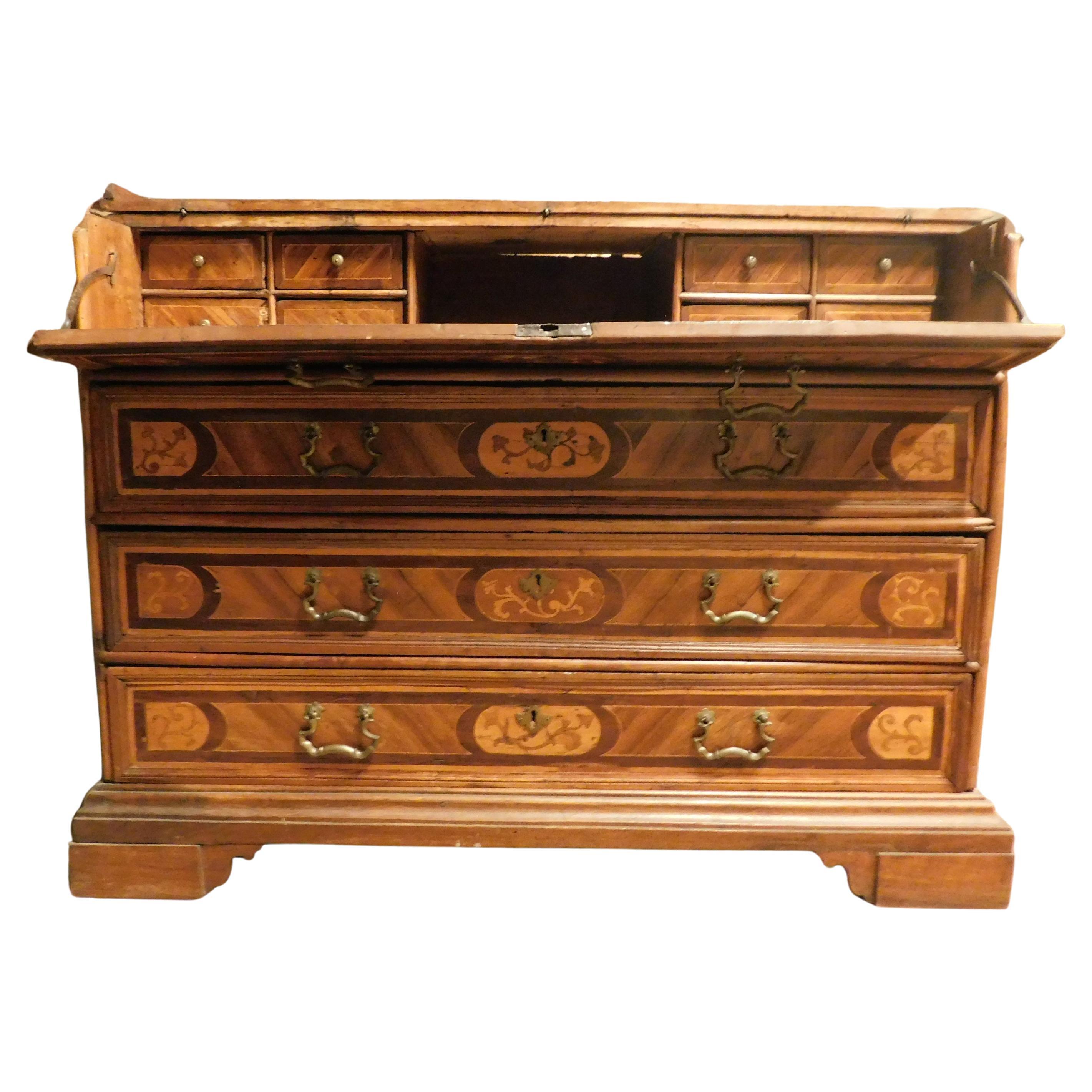 Folding chest of drawers in walnut with inlays, Italy