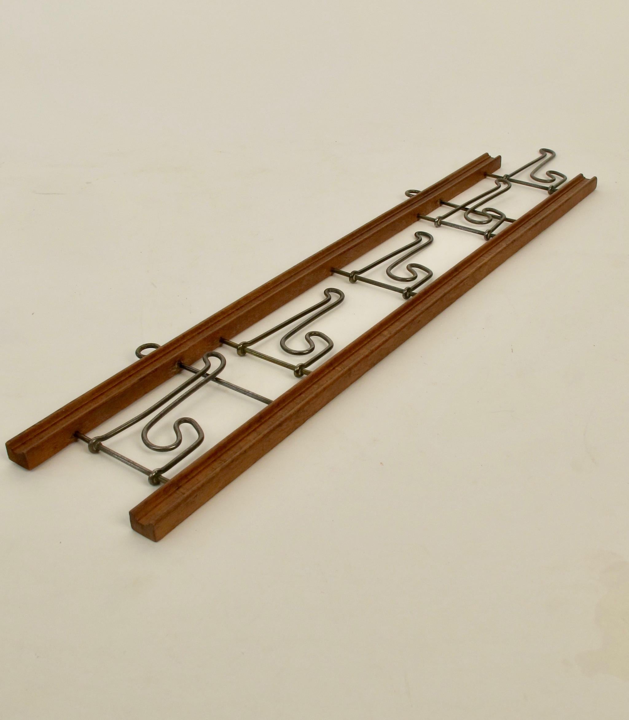 Metalwork Folding Coat Rack about 1900 made from Walnut and bent Metal For Sale