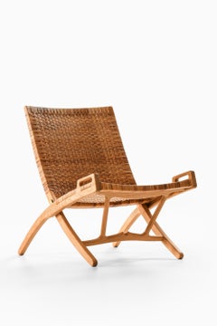 Folding Easy Chair in Cane and Oak by Hans Wegner, 1949
