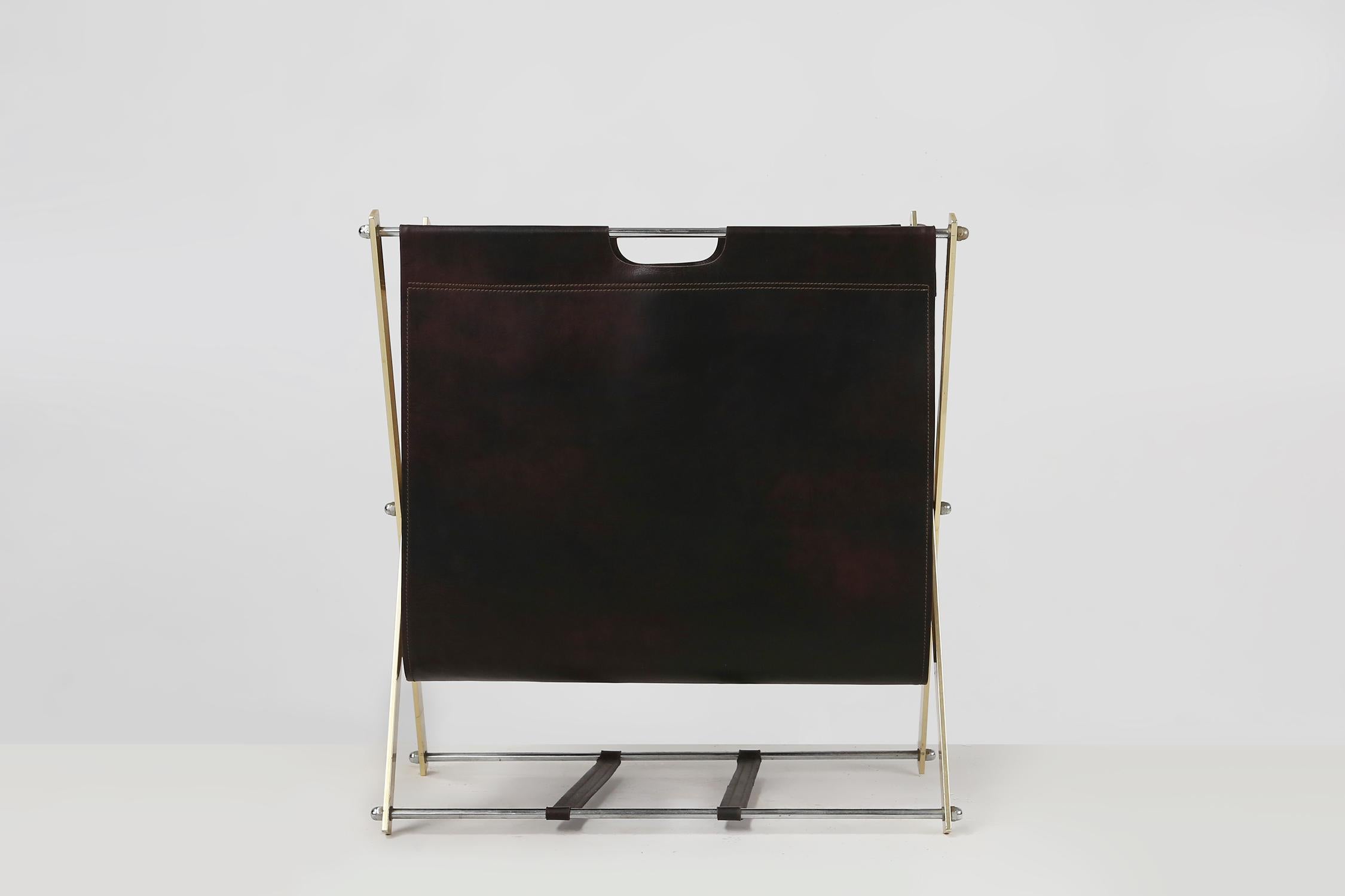 France / 1950 / magazine holder / Jacques Adnet / metal and leather / mid-century / vintage

A stunning brass and leather folding magazine rack designed by Jacques Adnet, France 1950s. This classic designed piece is a luxurious statement of style,